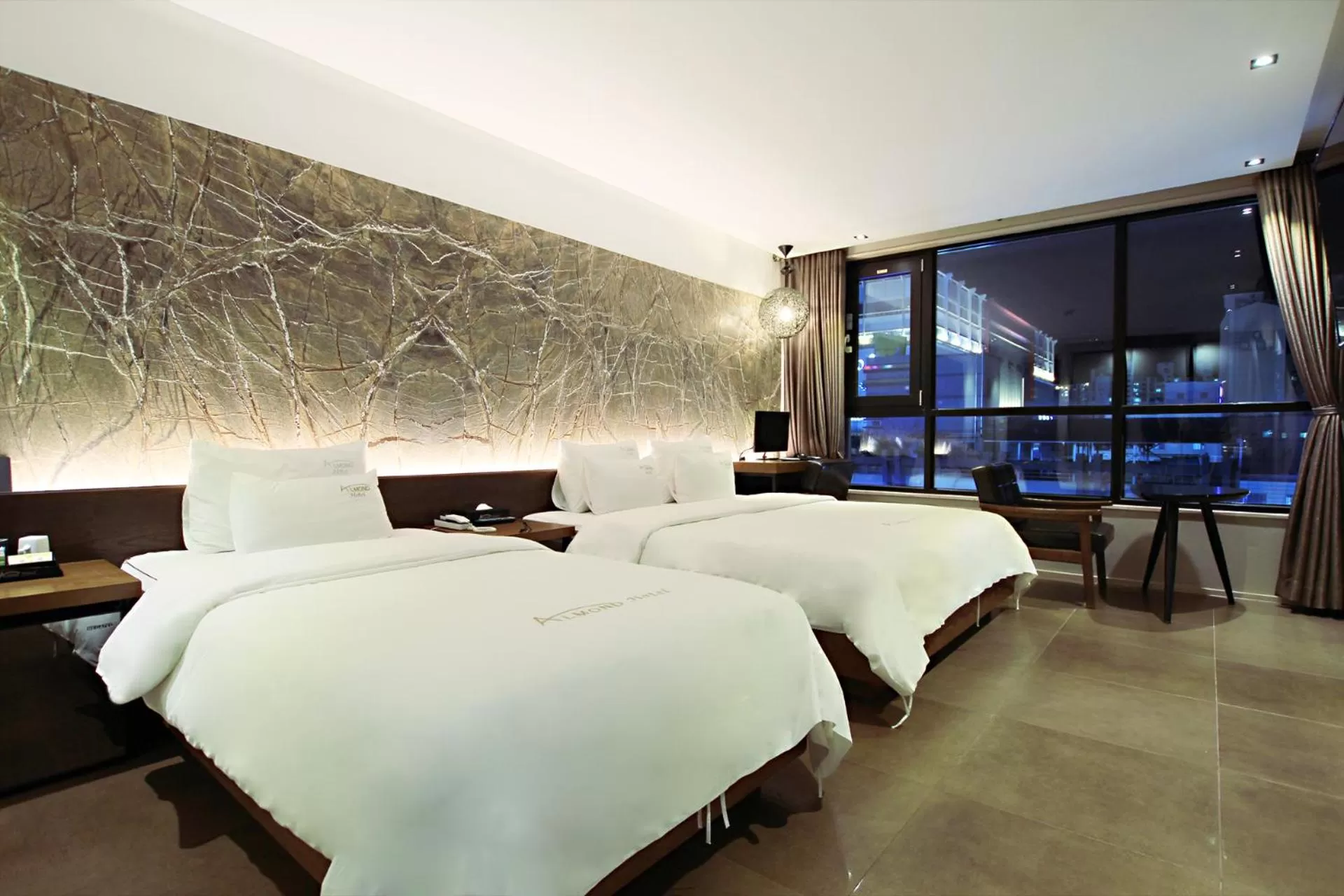 Photo of the whole room, Bed in Masan Almond Hotel