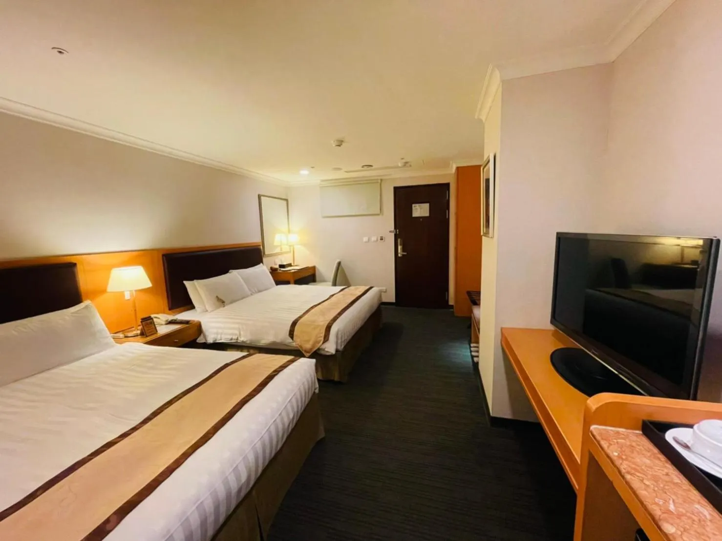 Photo of the whole room, Bed in Fuward Hotel Tainan