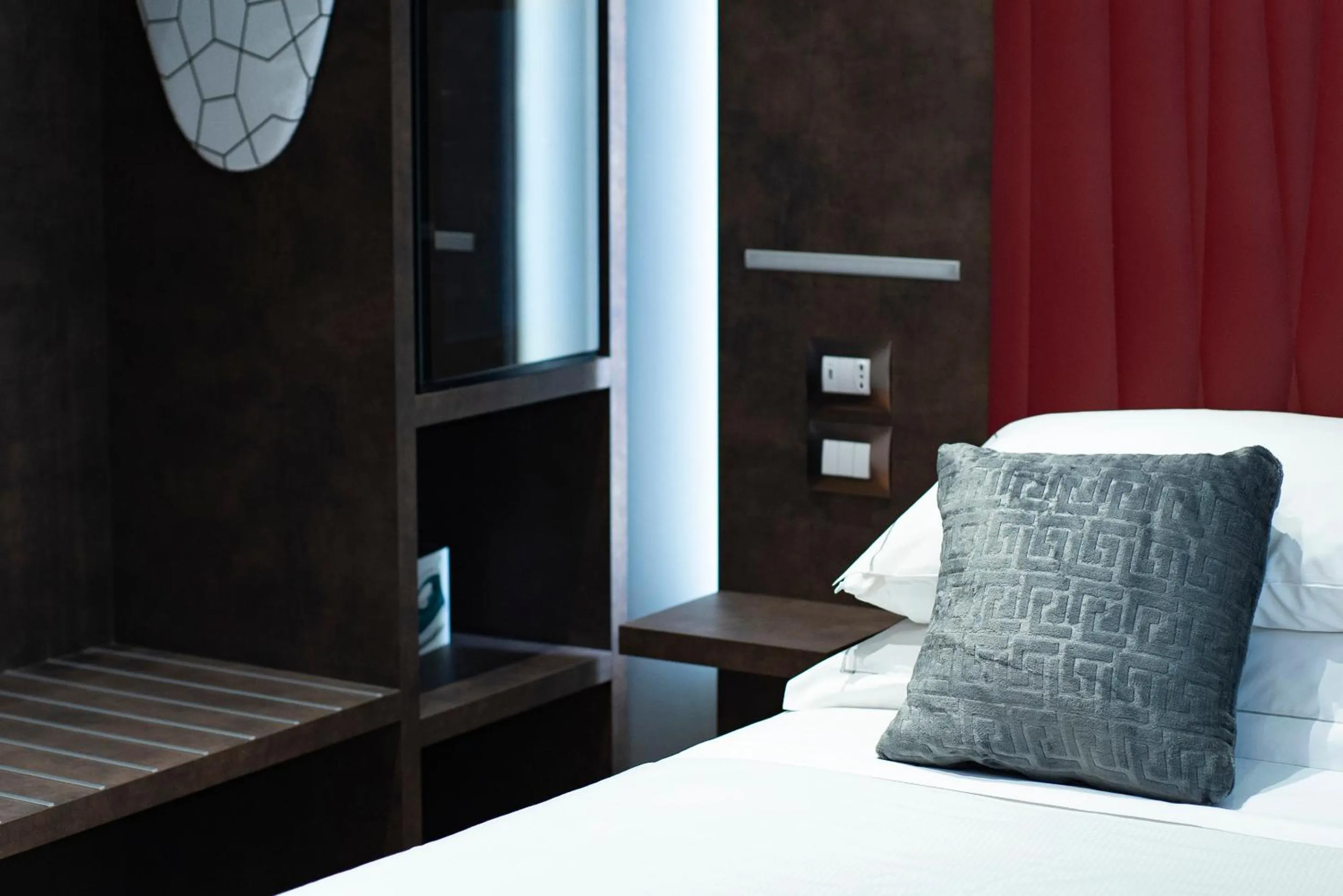 Bed in Artemide Guest House