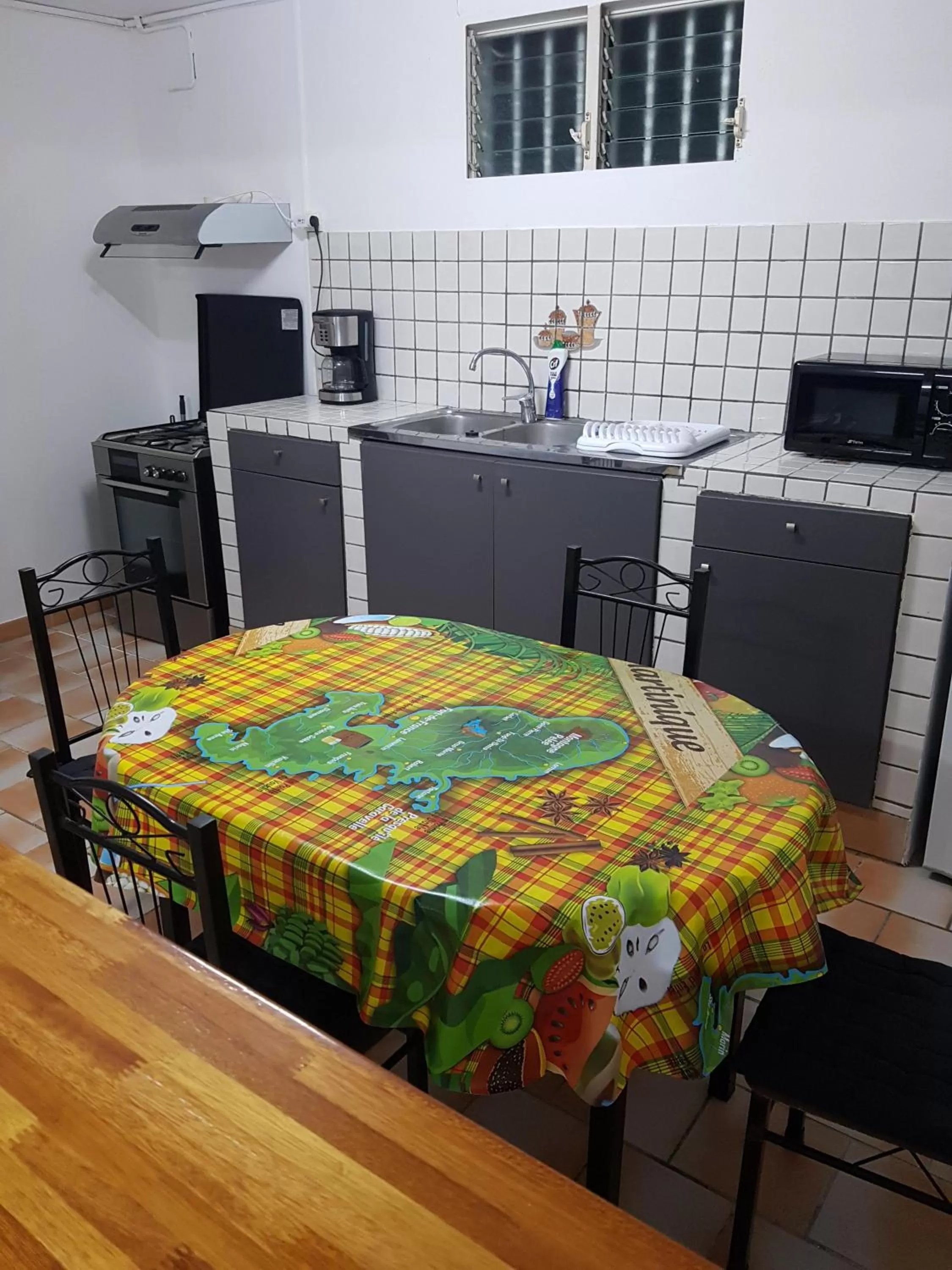 Kitchen or kitchenette in Appartement de la Baie