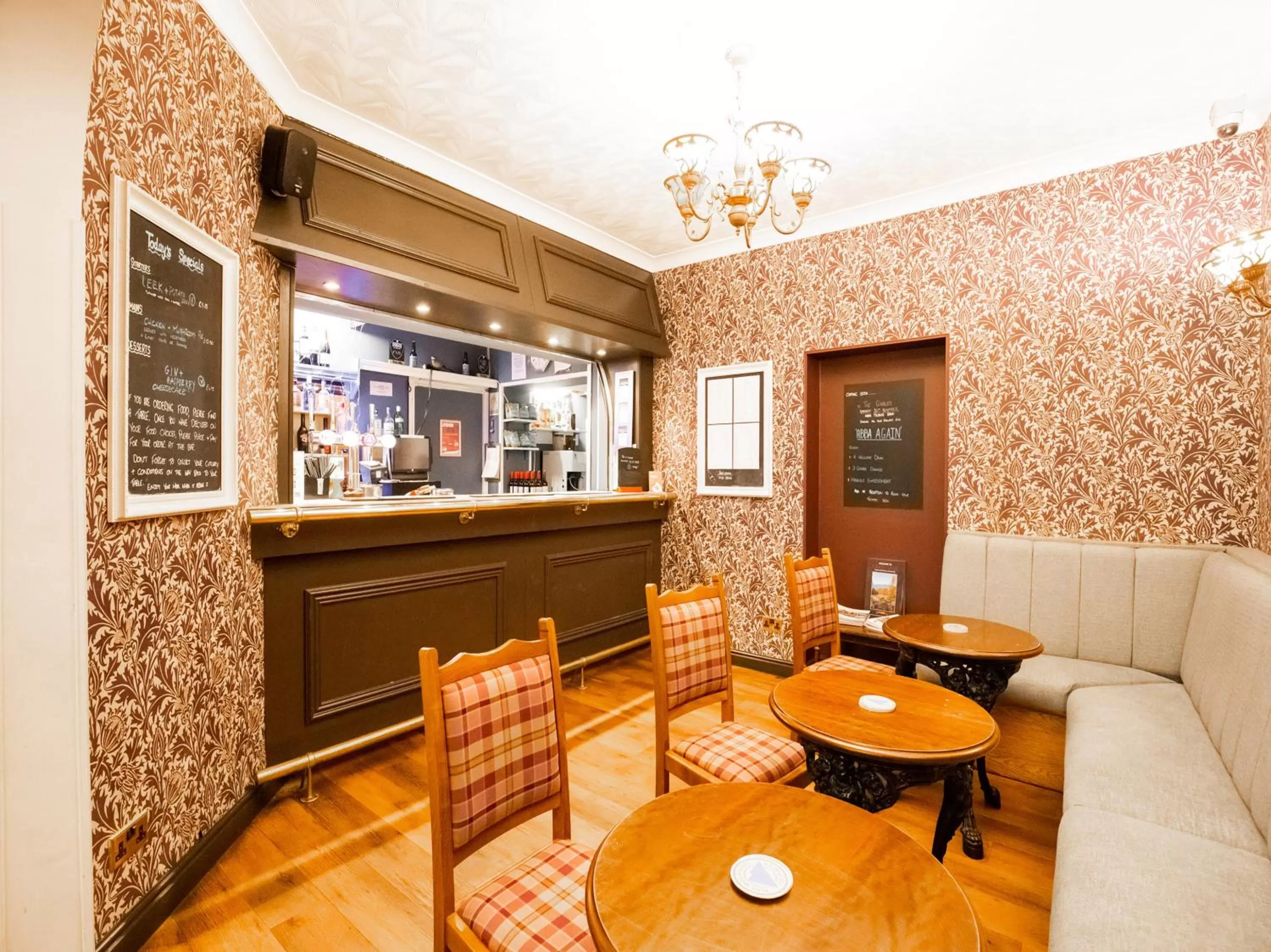 Lounge or bar in The Gables Hotel