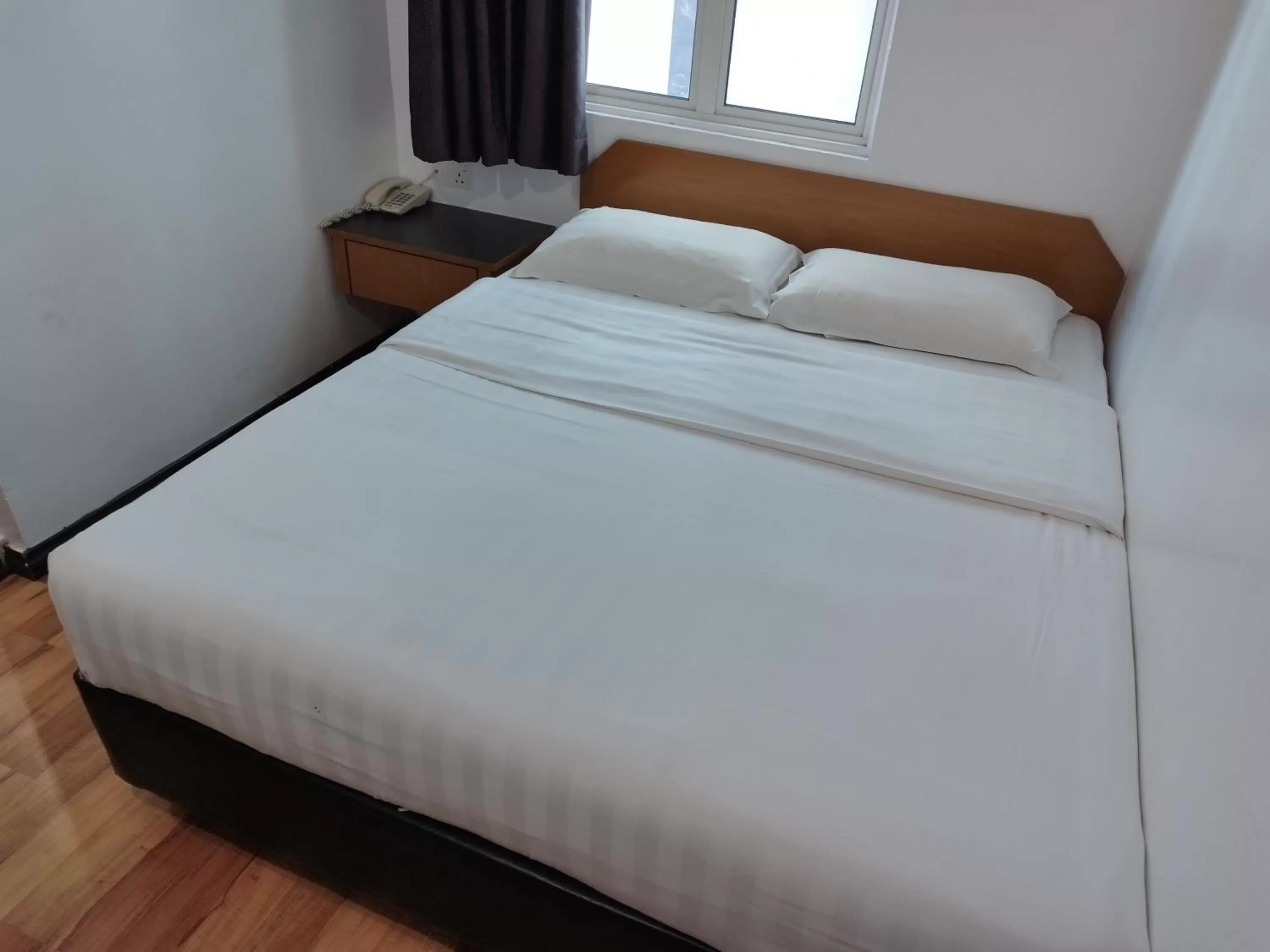 Bed in Marine Bay Hotel