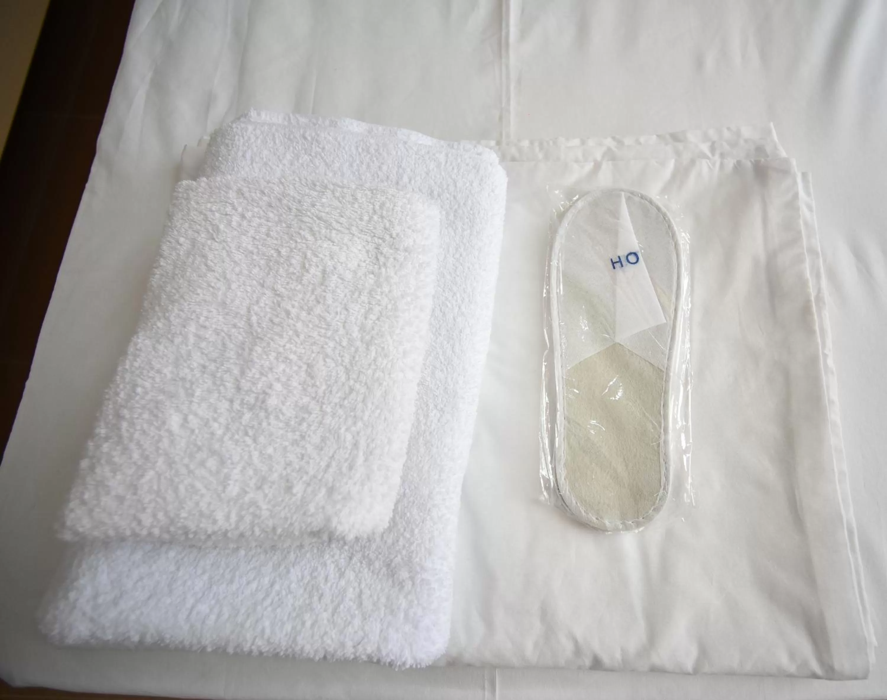 Bed in Orange Home Hotel