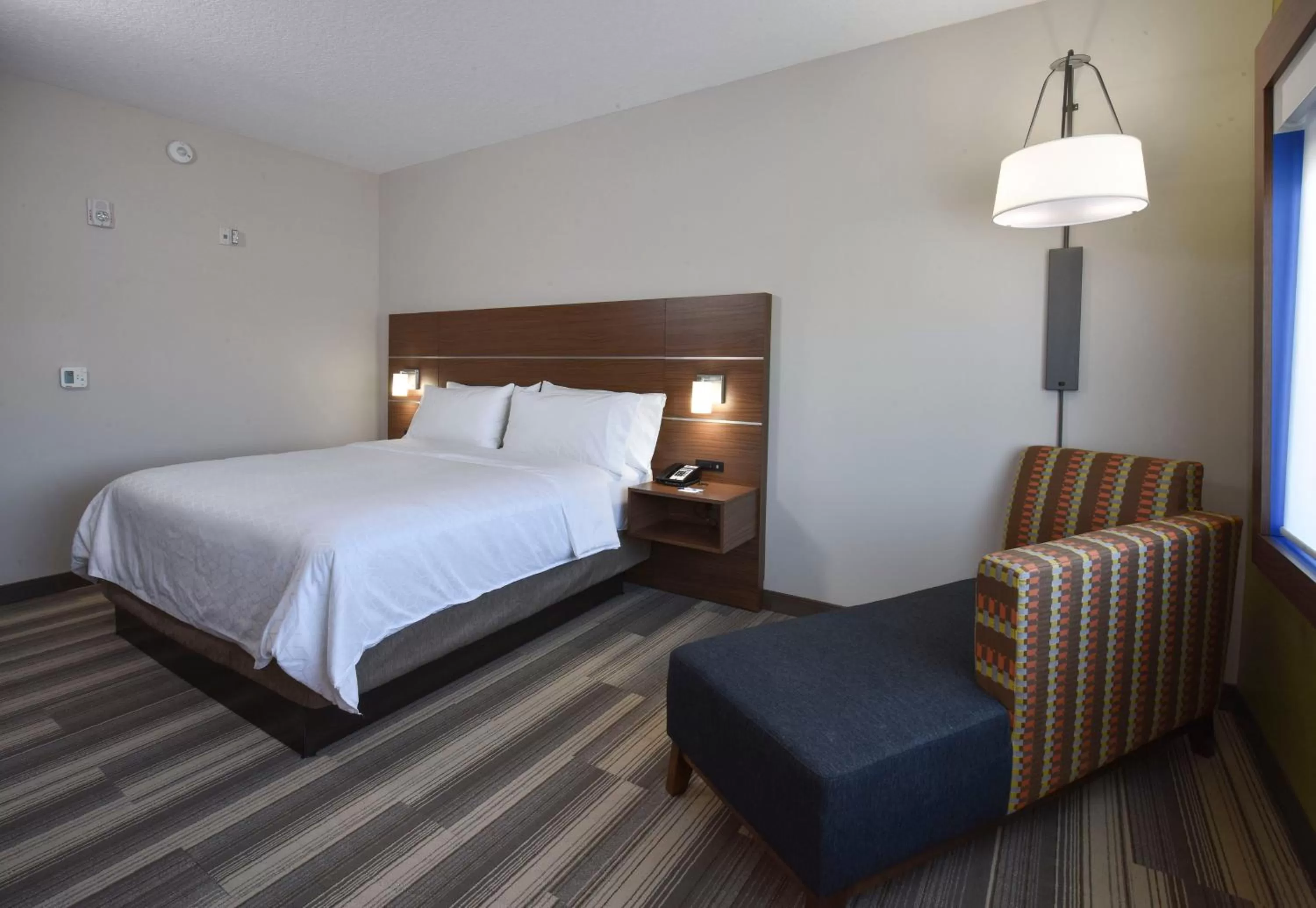 Photo of the whole room, Bed in Holiday Inn Express & Suites - Orlando - Southeast by IHG