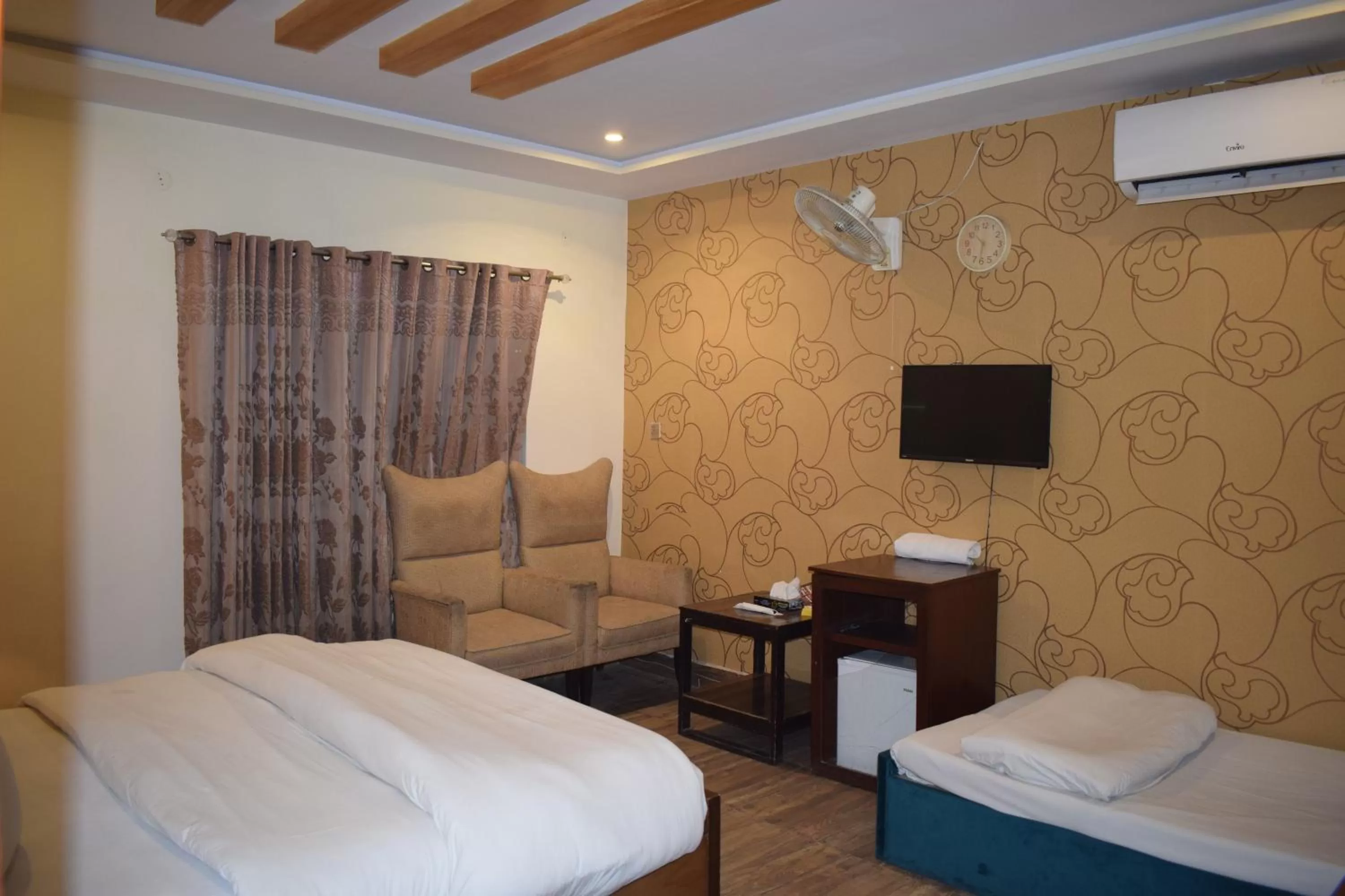 Bed in Hotel Grace inn