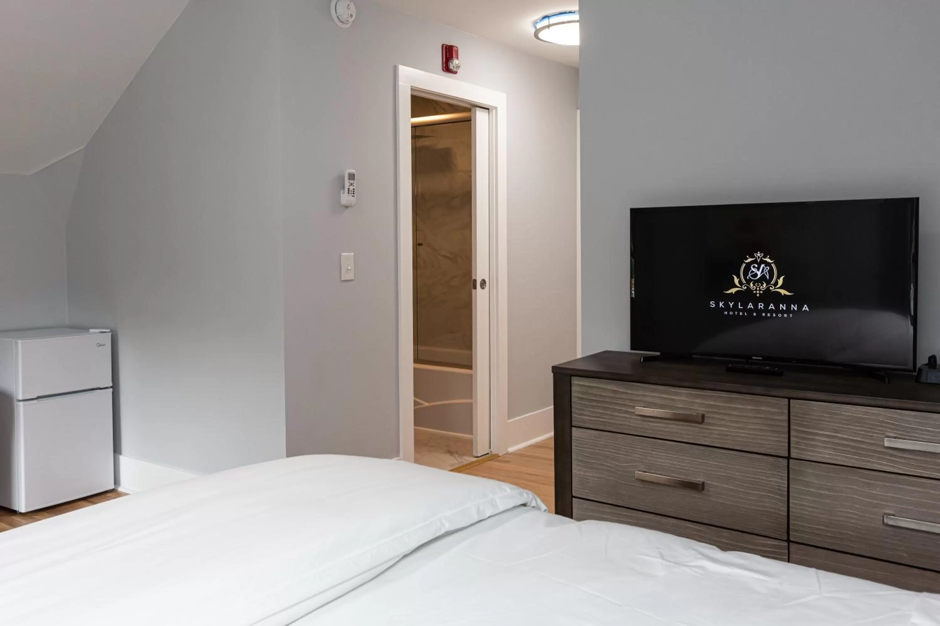 Bed in SKYLARANNA Resort & SPA