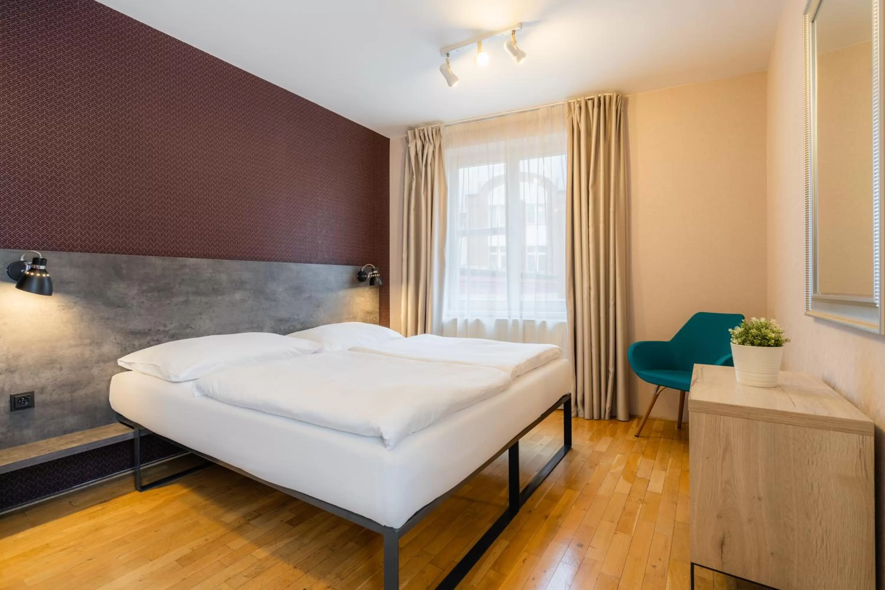 Bed in EA ApartHotel Melantrich