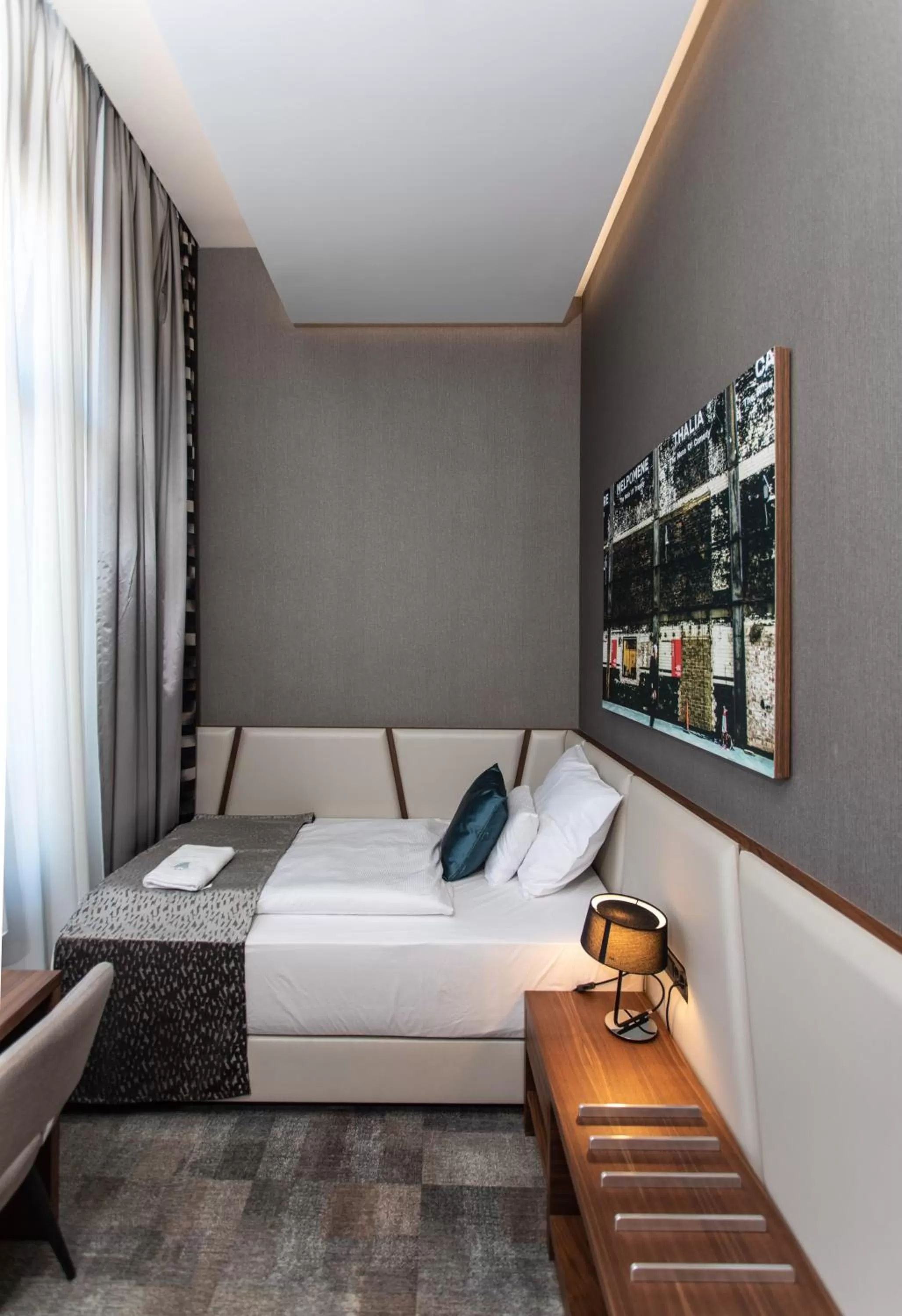 Bed in Artis Boutique Hotel