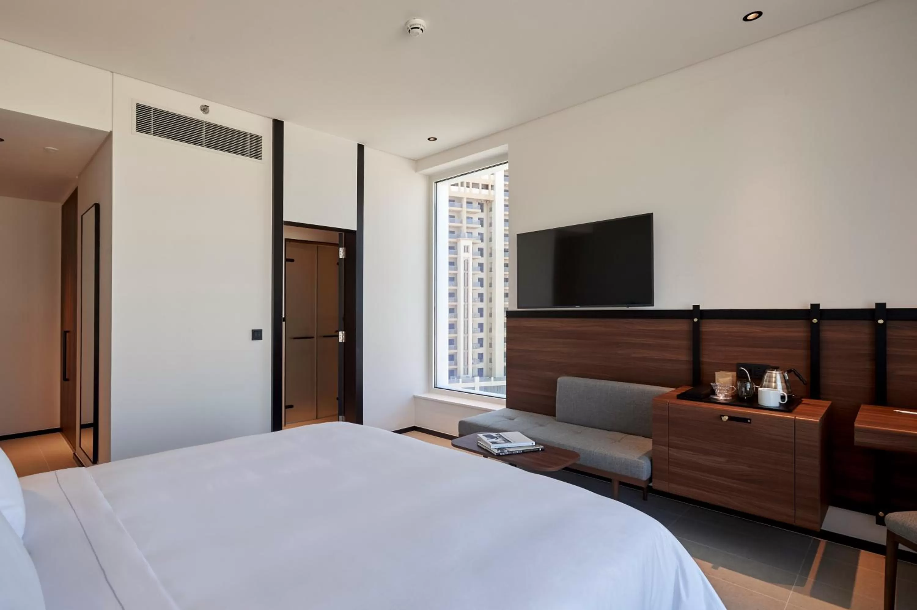 Bed in FORM Hotel Al Jaddaf, Dubai, a Member of Design Hotels