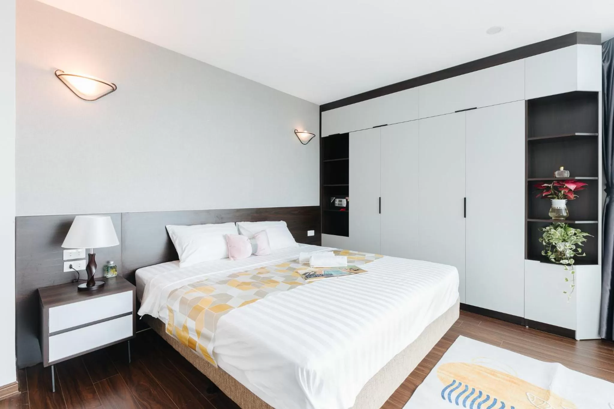 Bed in Ivy Hotel & Apartment