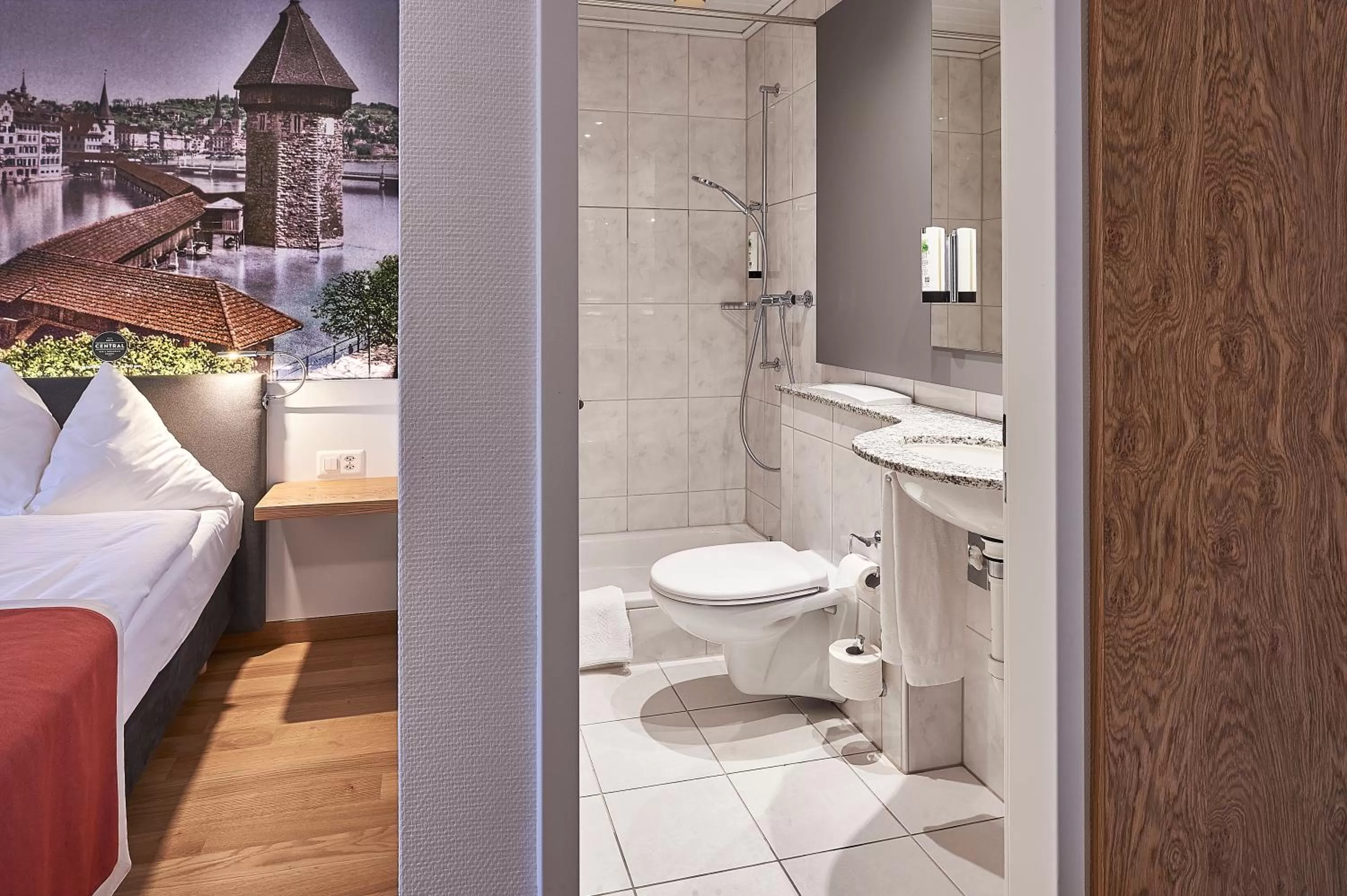 Photo of the whole room, Bed in Hotel Central Luzern