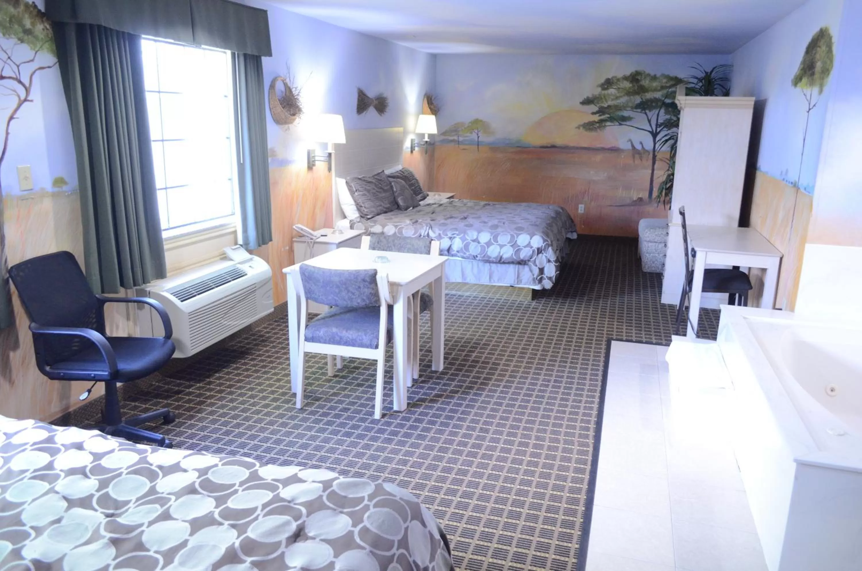 Bedroom, Bed in Scottish Inn and Suites NRG Park/Texas Medical Center - Houston