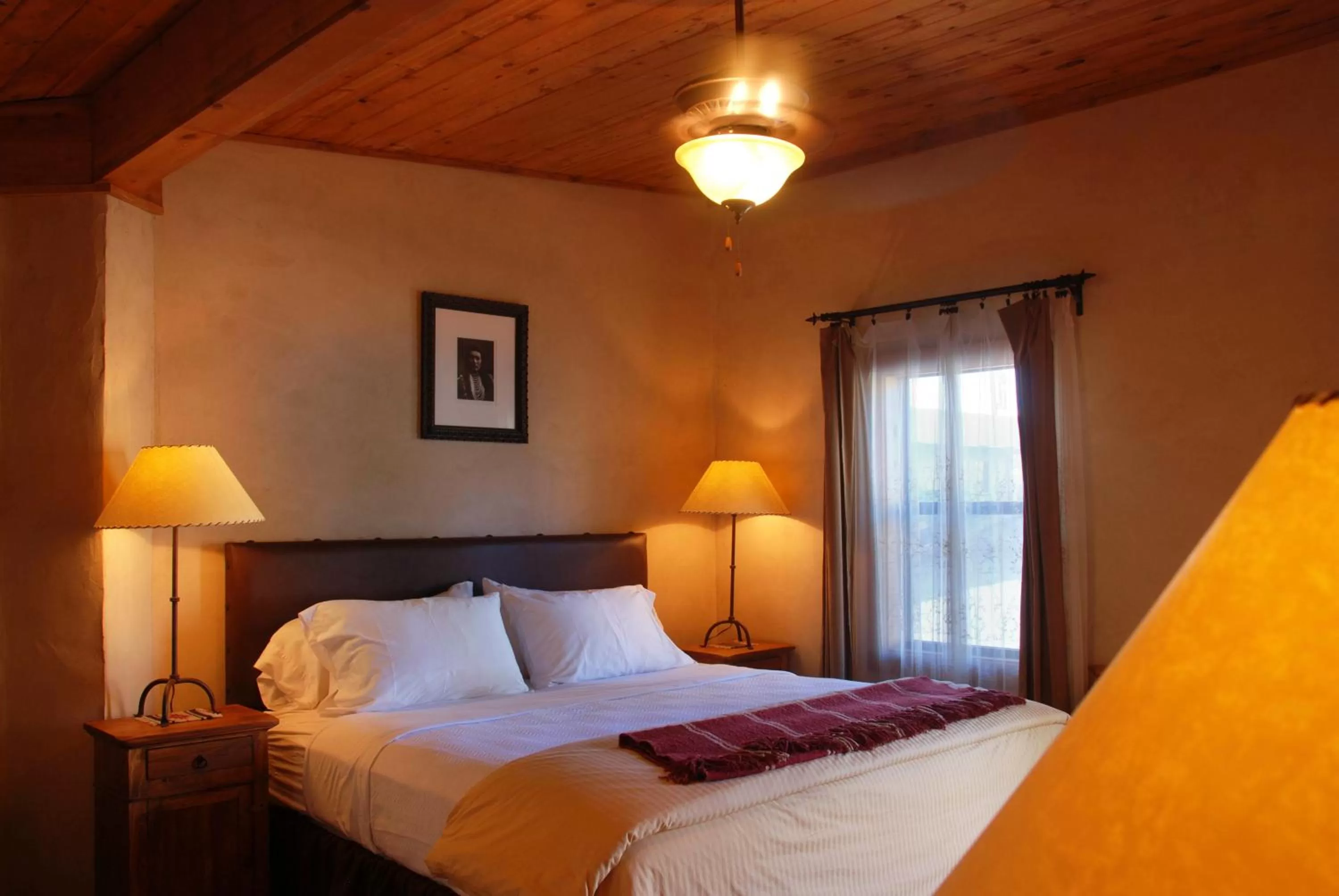 Bed in The Maverick Inn