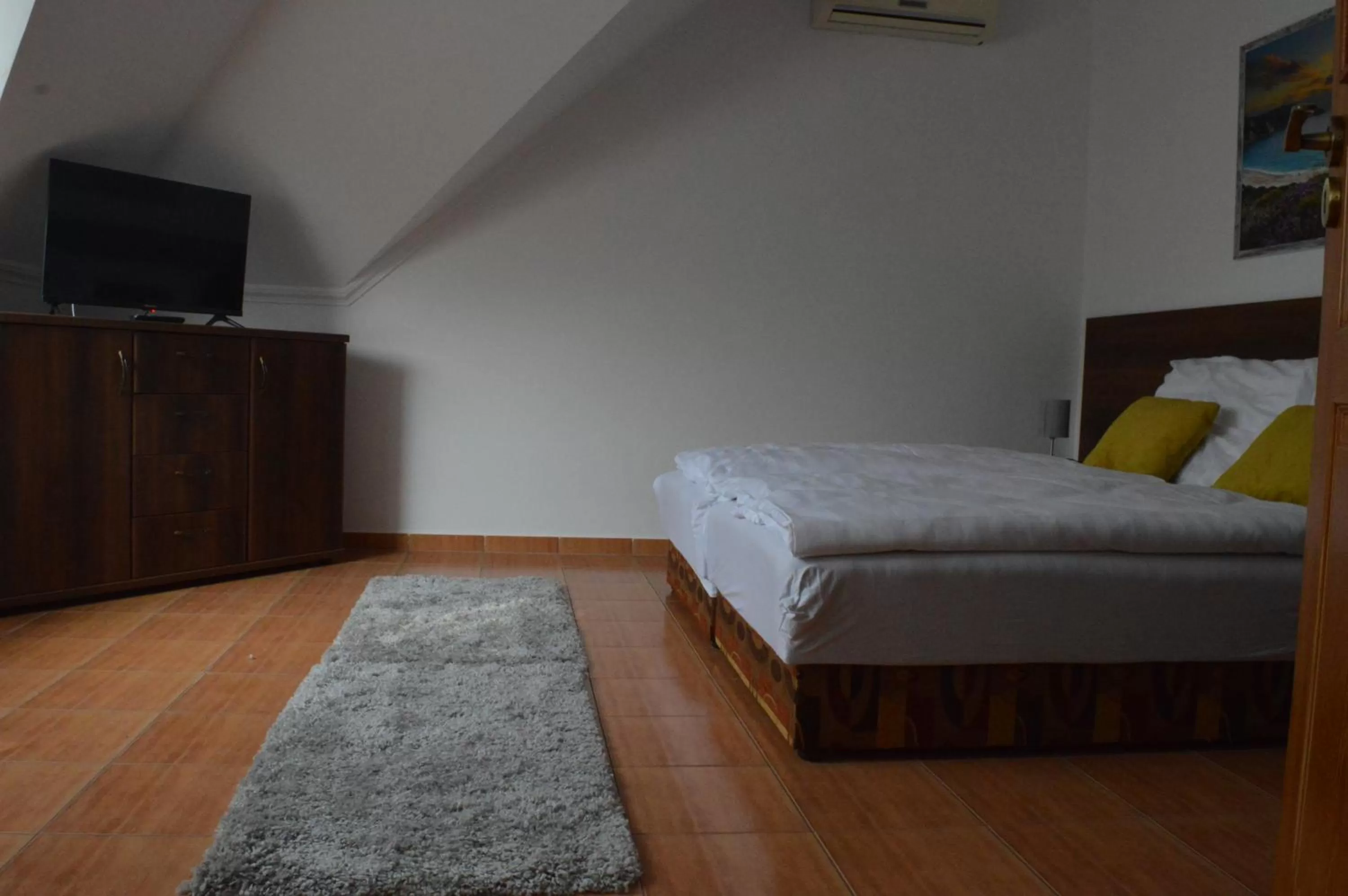 Bed in Aqua Oazis Apartman