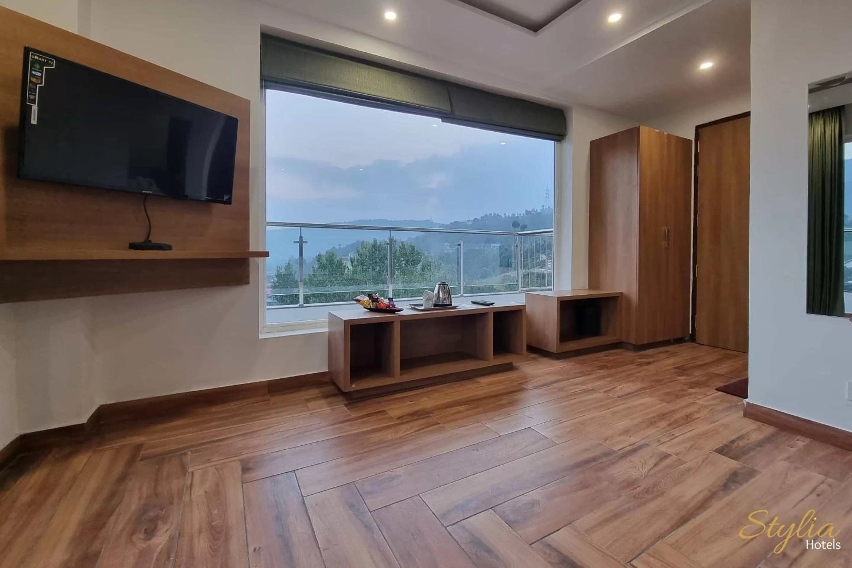 TV and multimedia, TV/Entertainment Center in Moon Glade By Stylia Hotels