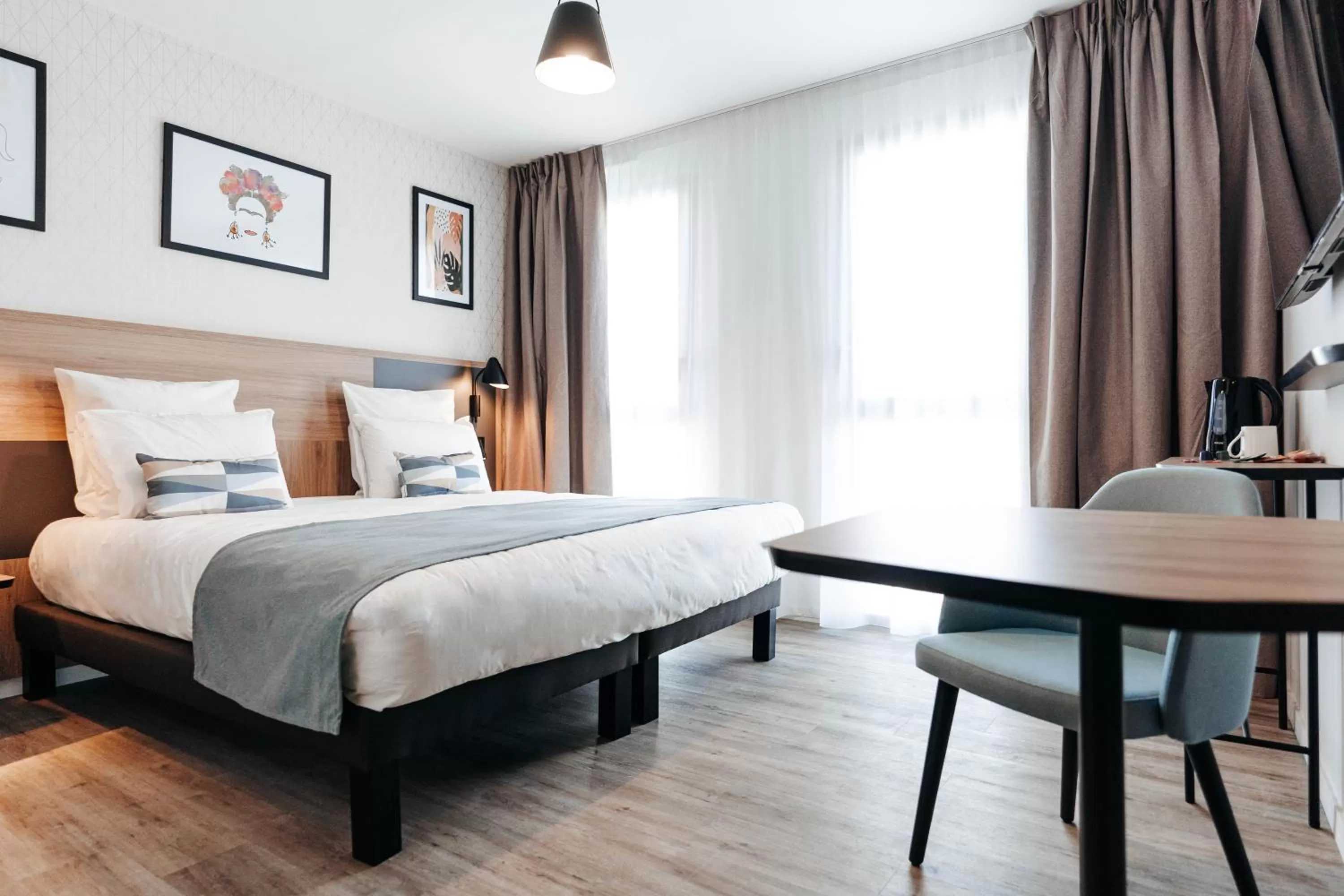 Photo of the whole room, Bed in Appart'City Collection Saint Germain en Laye