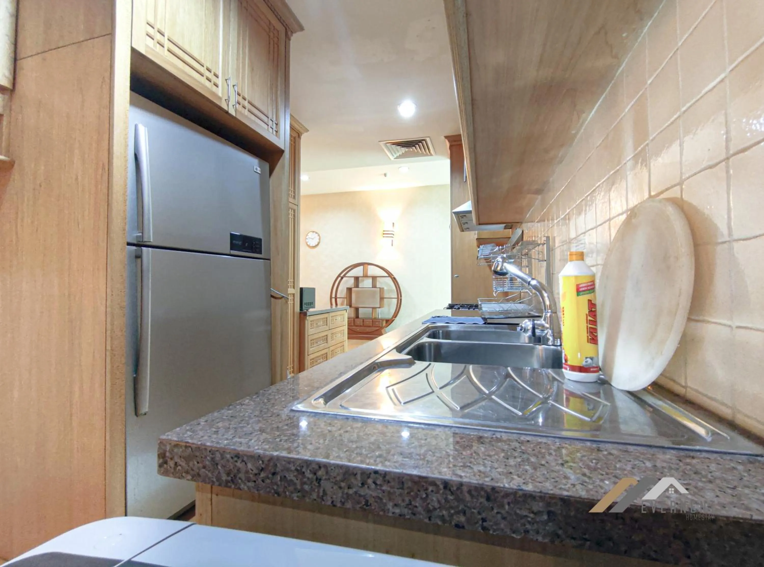 Kitchen or kitchenette in Mciti Suites by Evernent