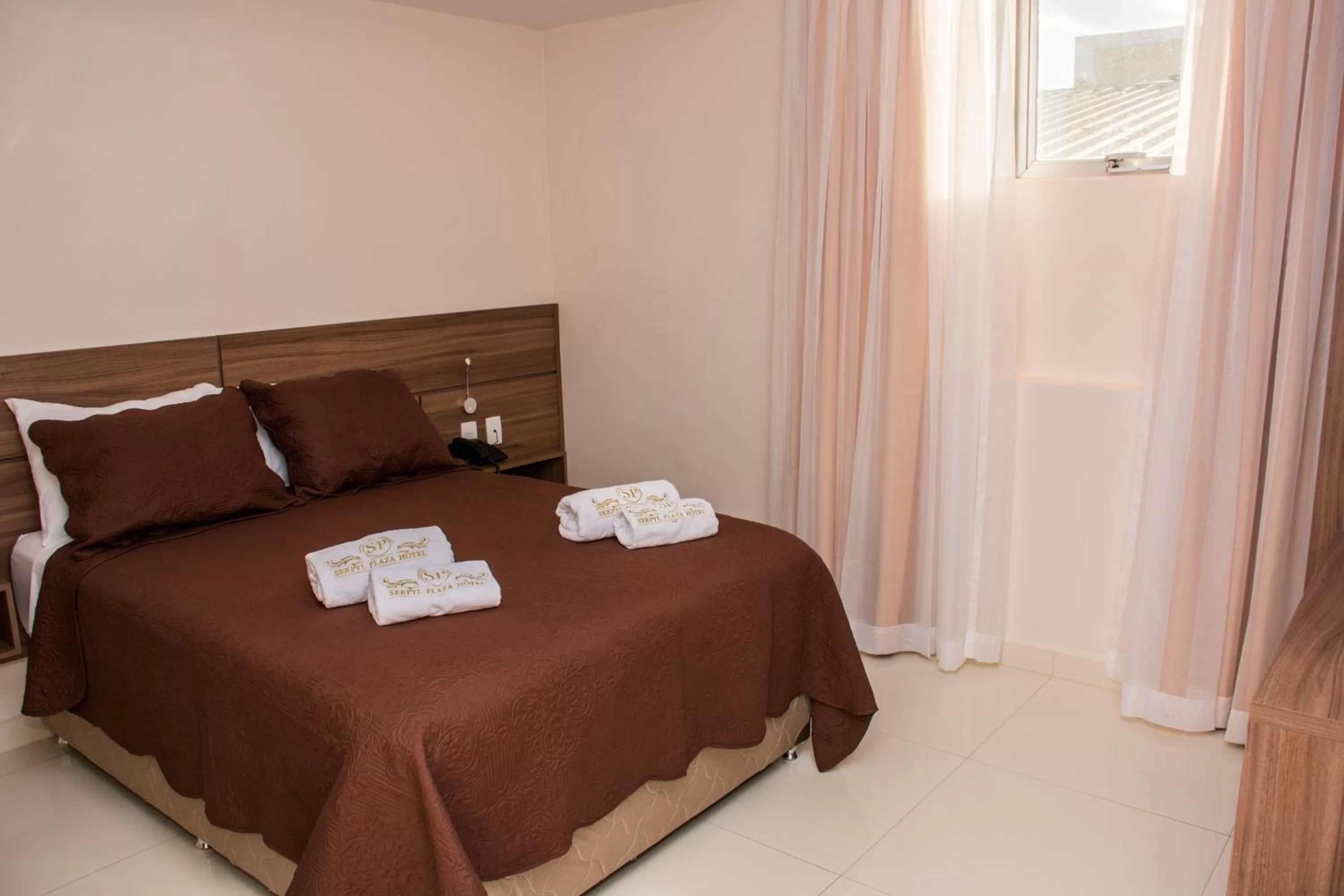 Bed in SERPYL Plaza Hotel