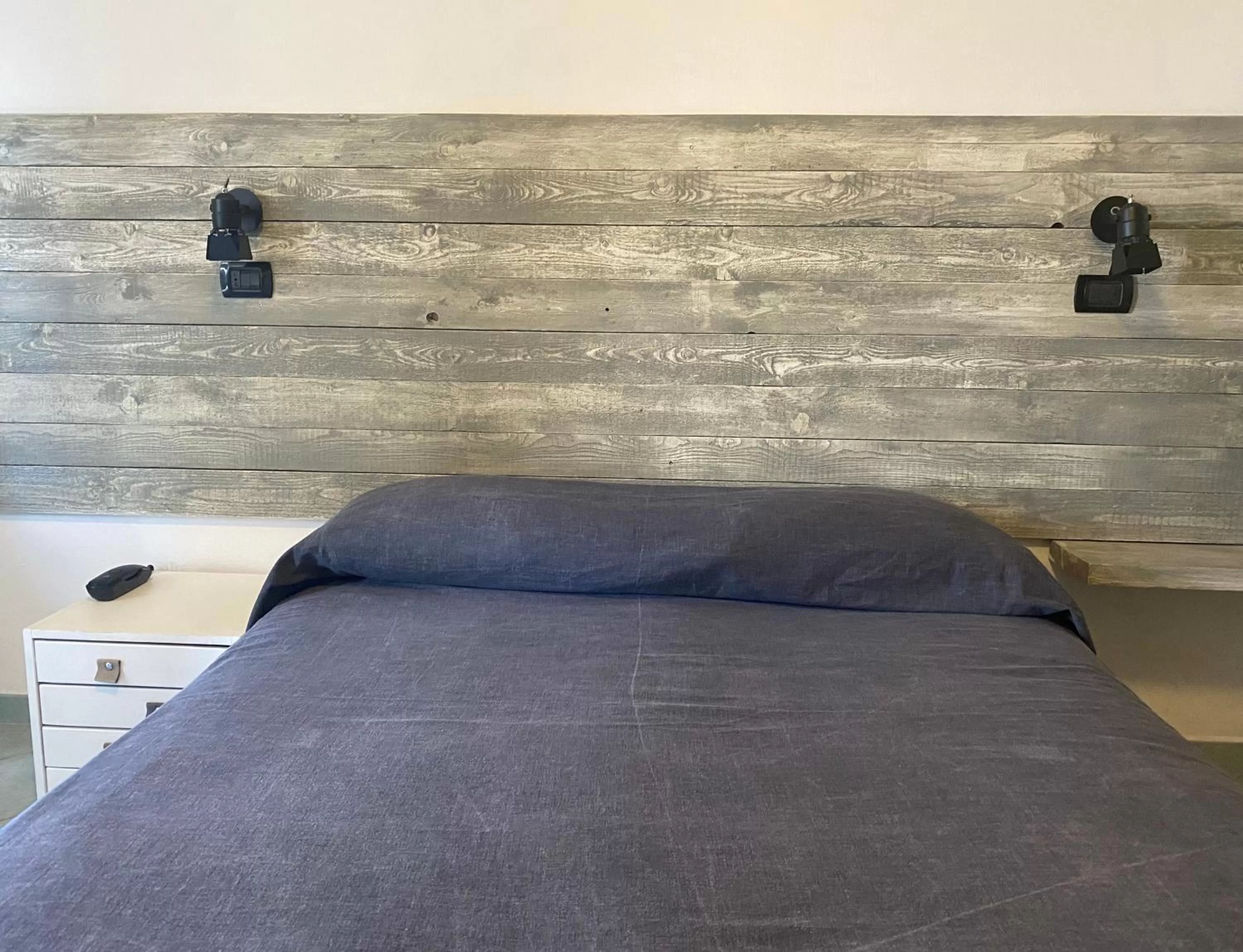 Bedroom in Black Market Hotel