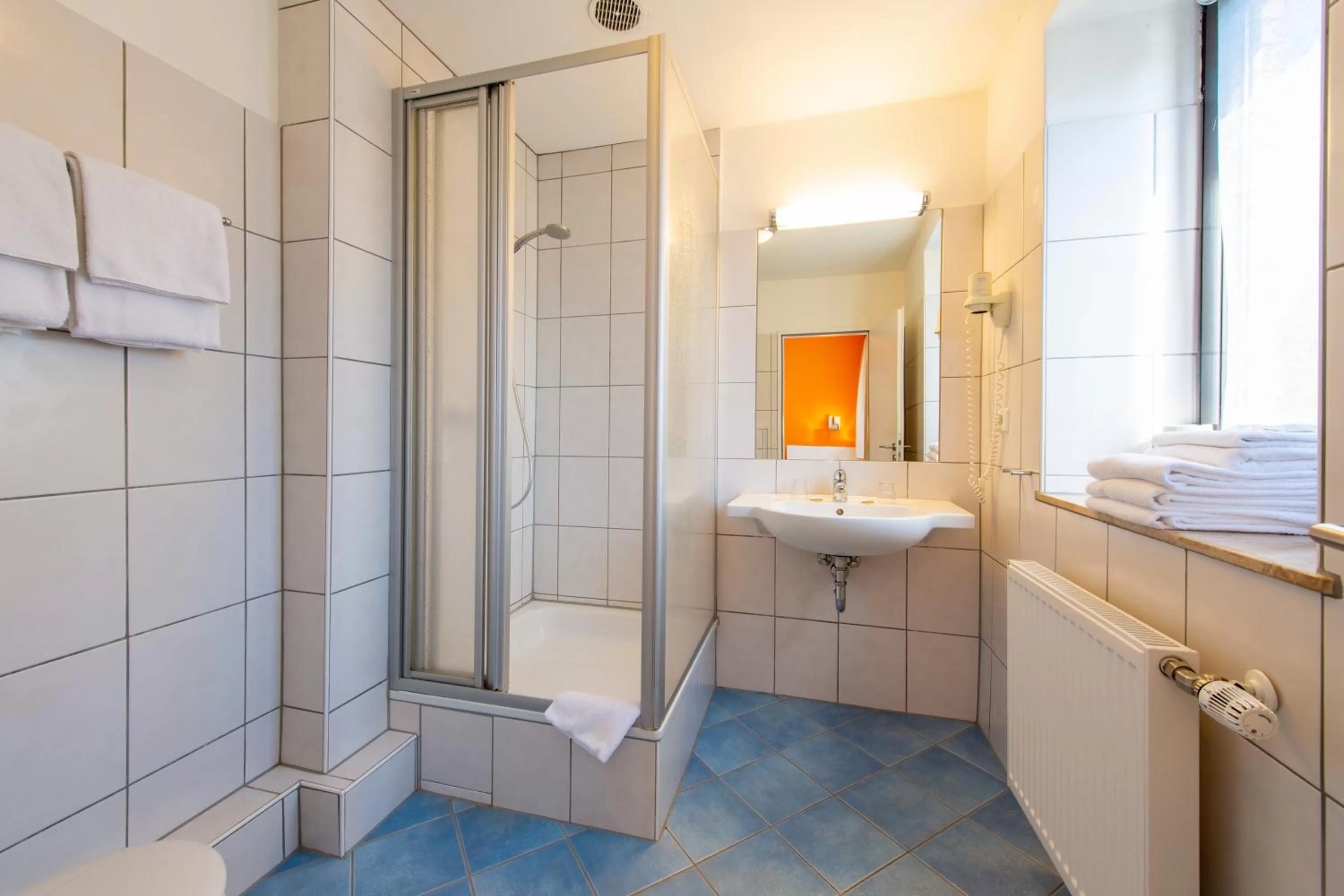 Bathroom in Hotel Heldt Dependance