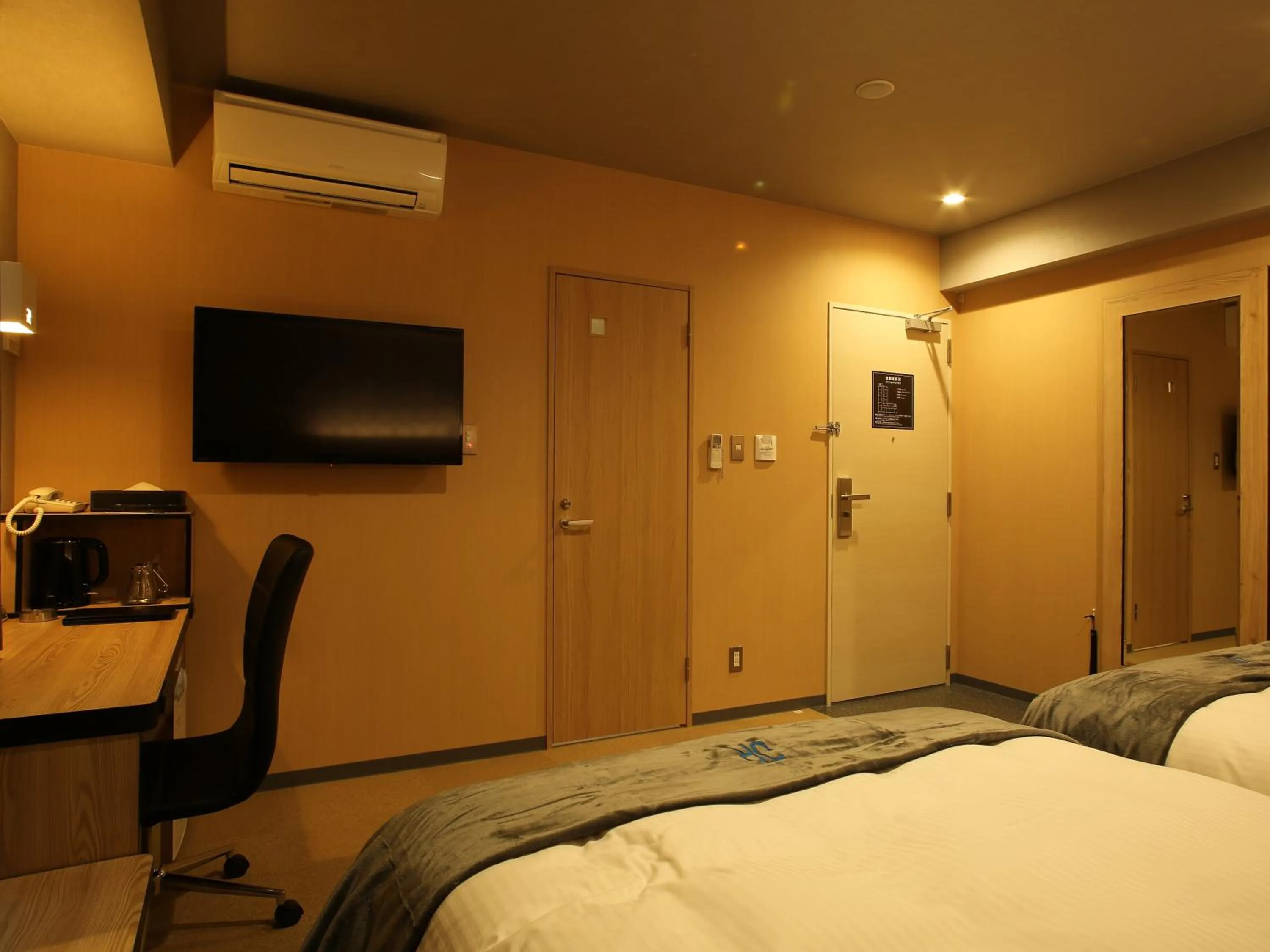 Photo of the whole room, Bed in Green Rich Hotel & Capsule Naha - Artificial hot spring Futamata Yunohana
