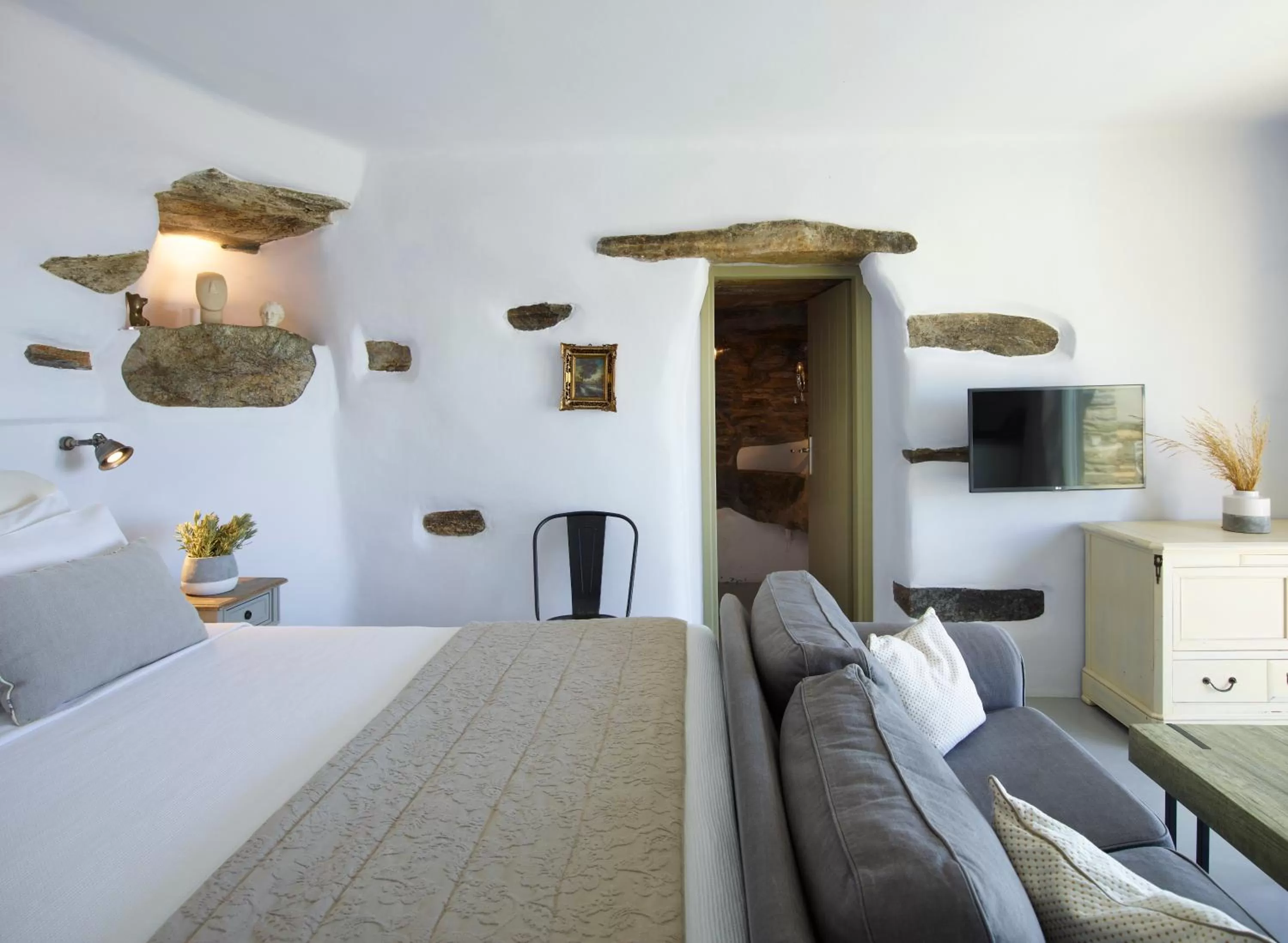 Bed in Aeolis Tinos Suites