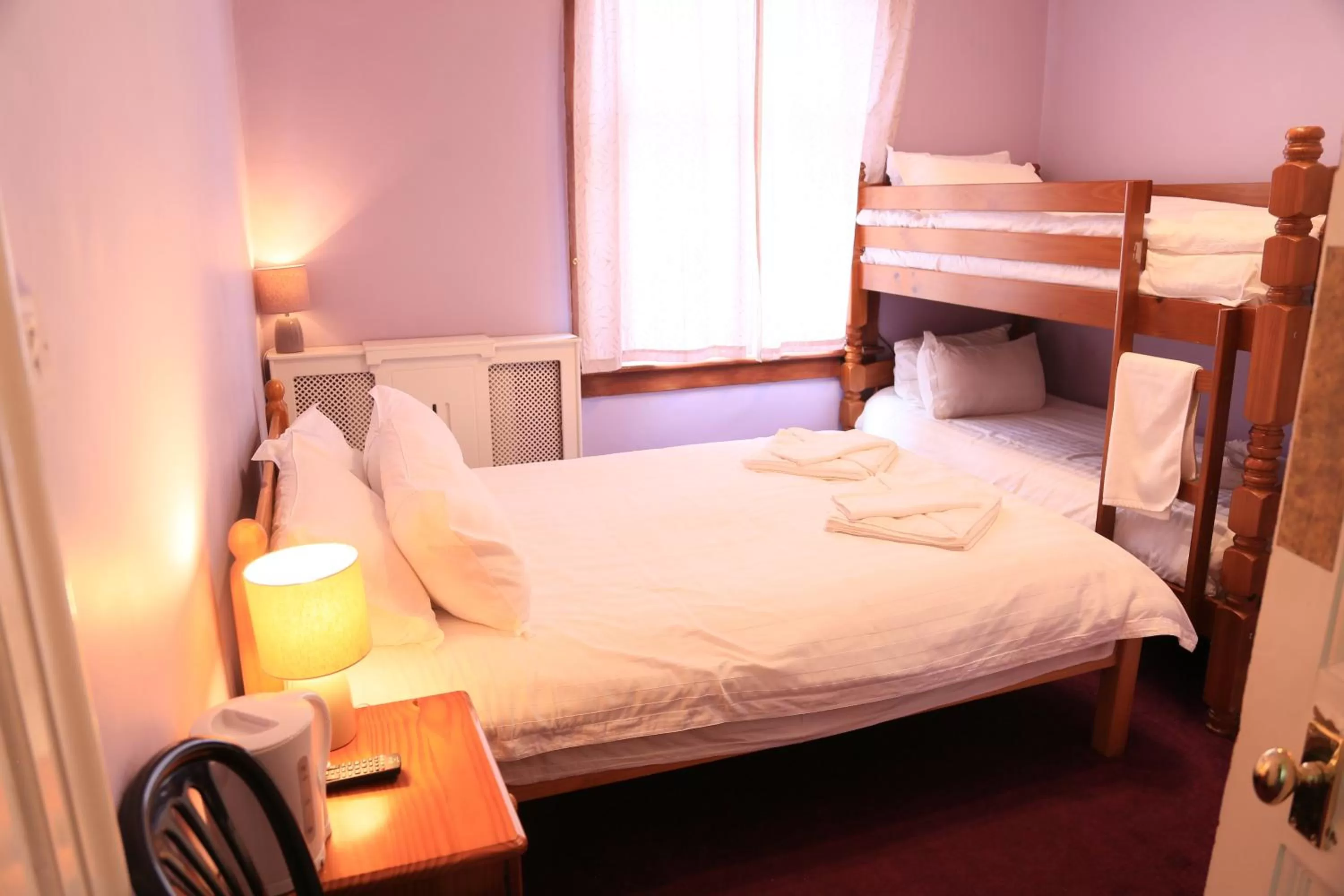 Bed in Twin Lions Hotel