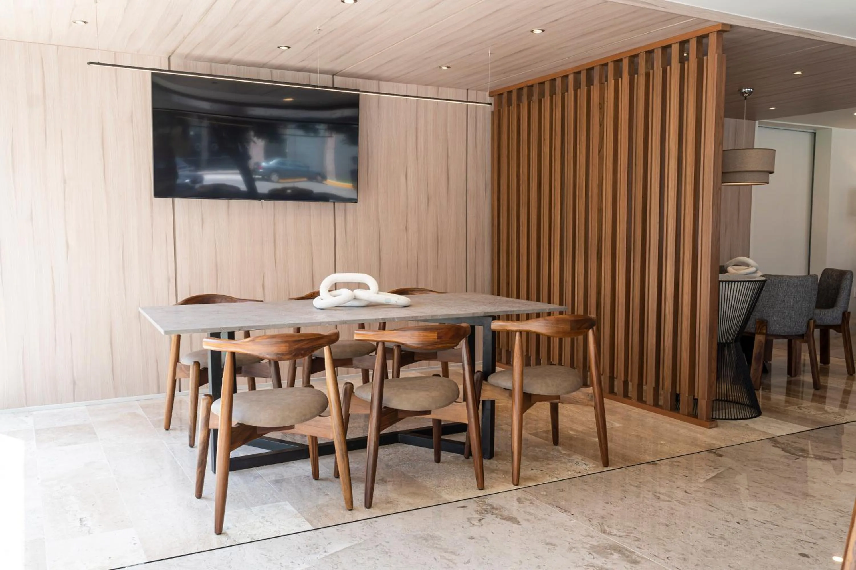 Living room in La Posada Hotel y Suites