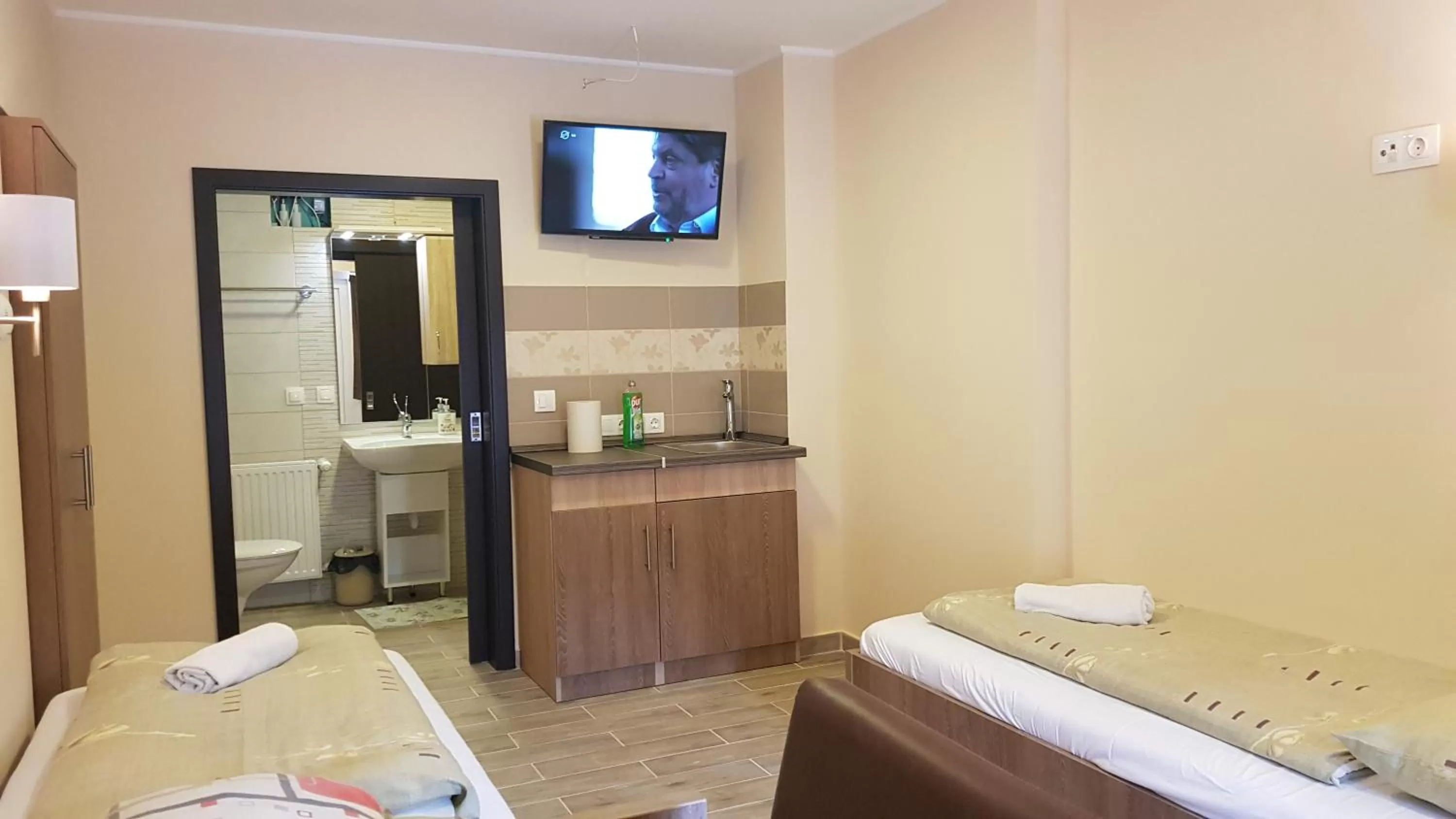 Bed in Central Panzió Gyula