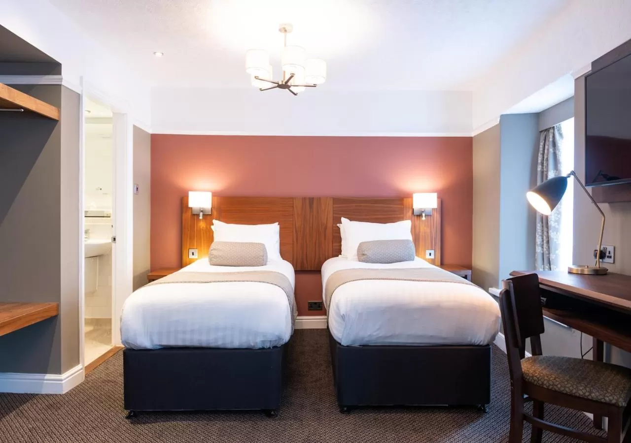 Bed in The White Lion by Innkeeper's Collection