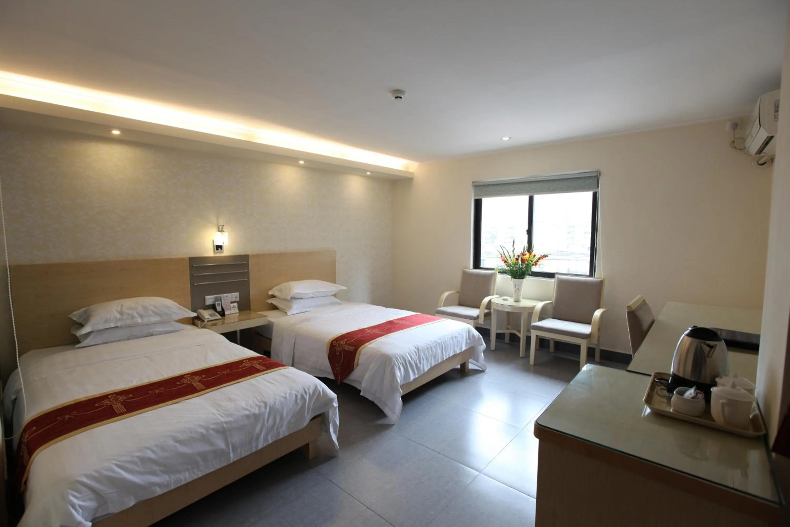 Bed in Guang Dong Hotel