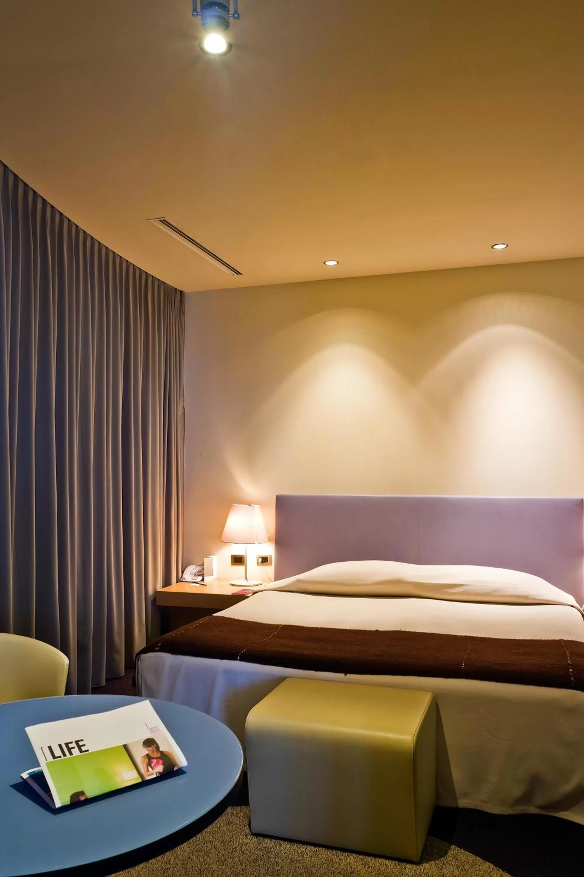 Bed in UNA HOTELS T Hotel Cagliari