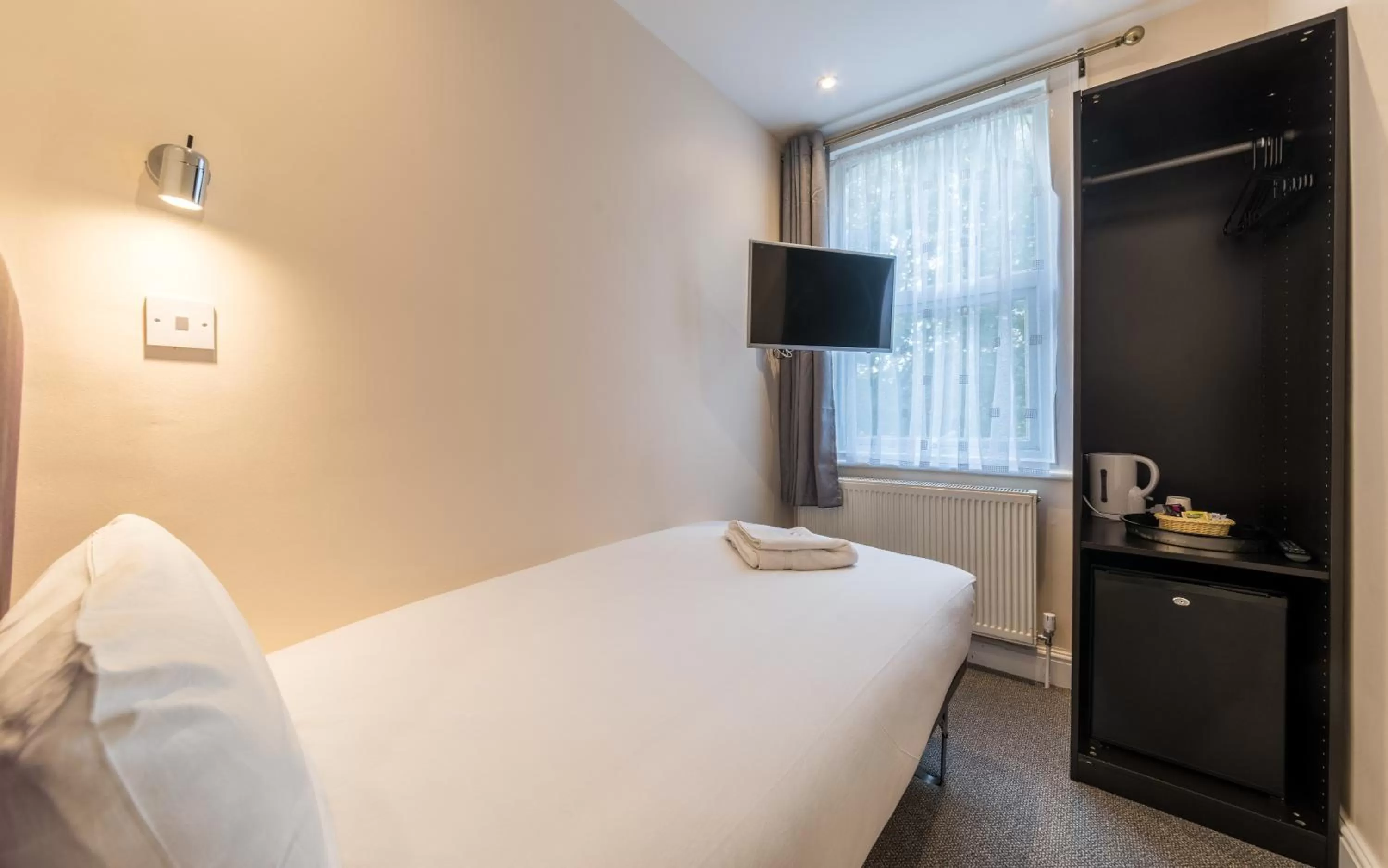 TV/Entertainment Center in Royal London Hotel By Saba