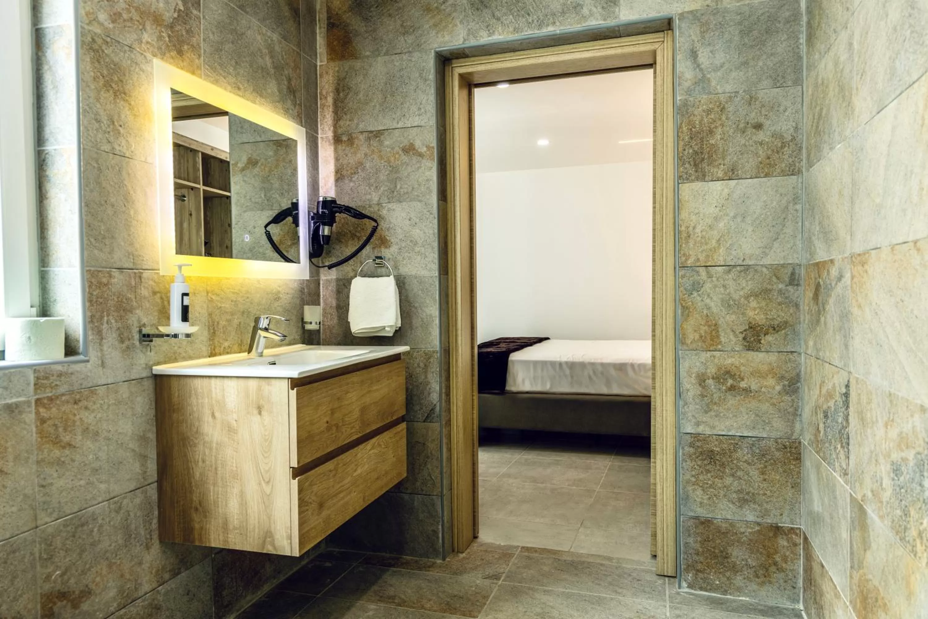 Bathroom, Bed in The Mike Hotel by CX Collection