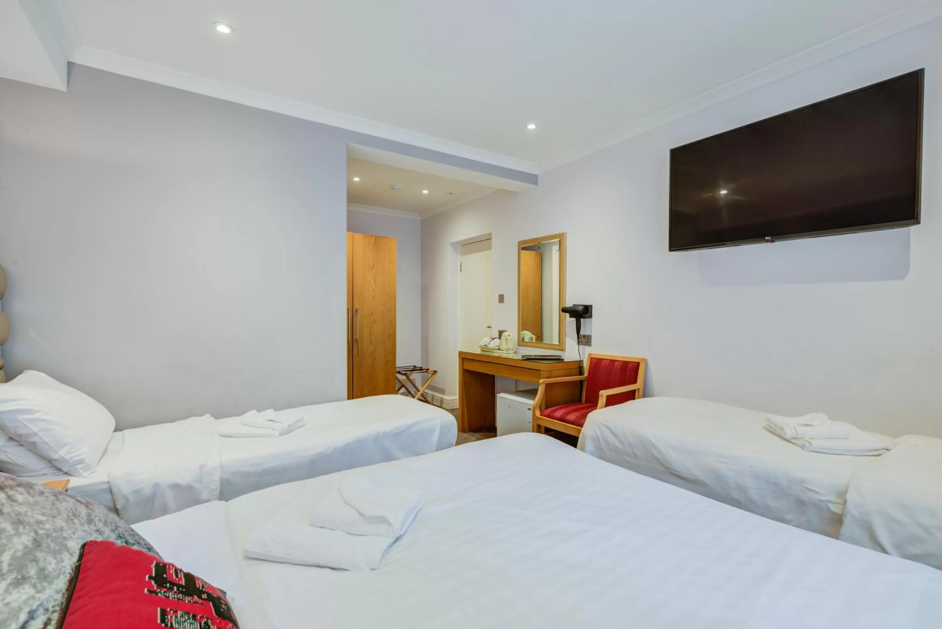 Bed in Admiral Hotel at Park Avenue