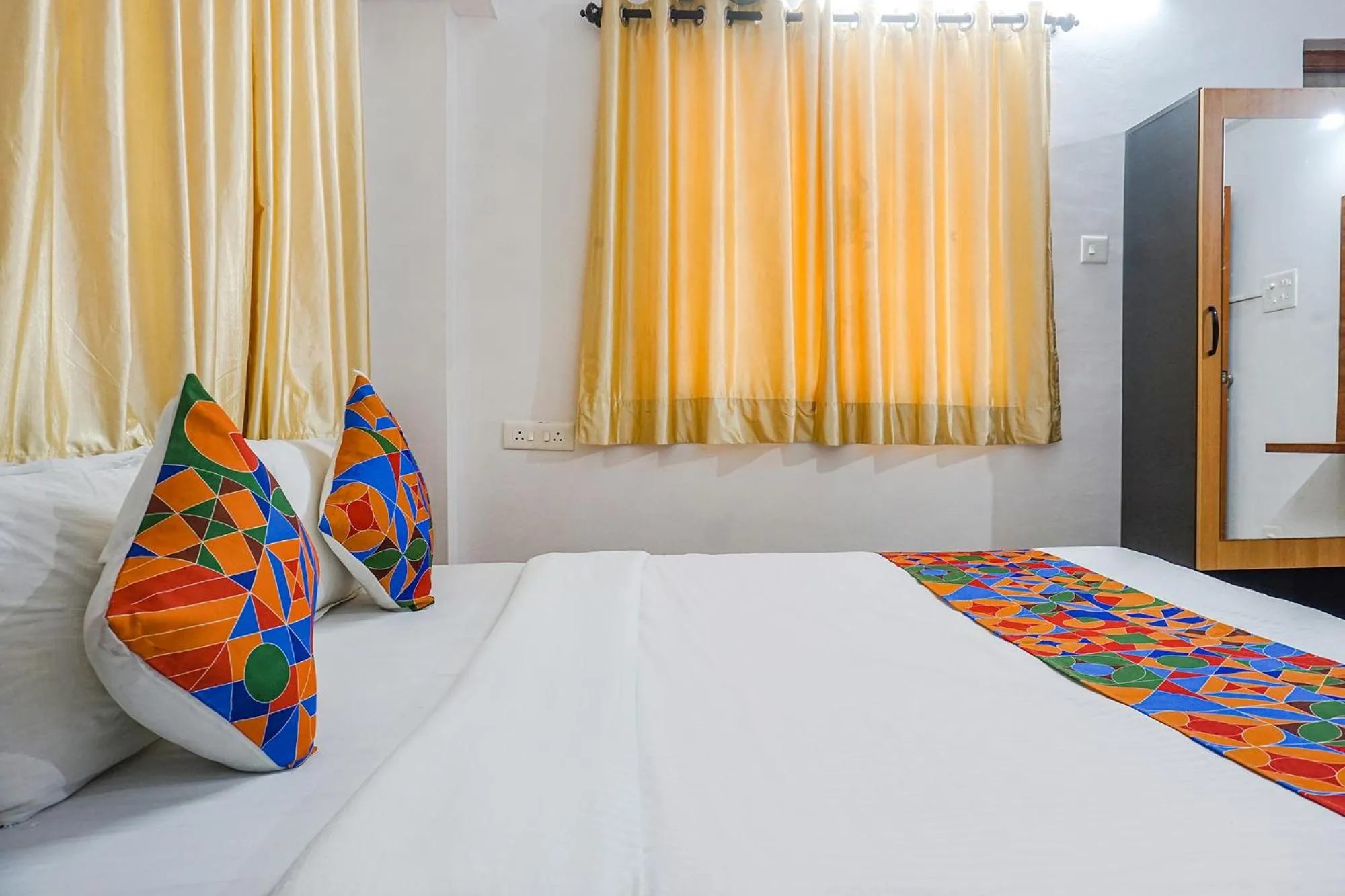 Bed in FabHotel Lake View - Chinmaya Vitthal Mandir
