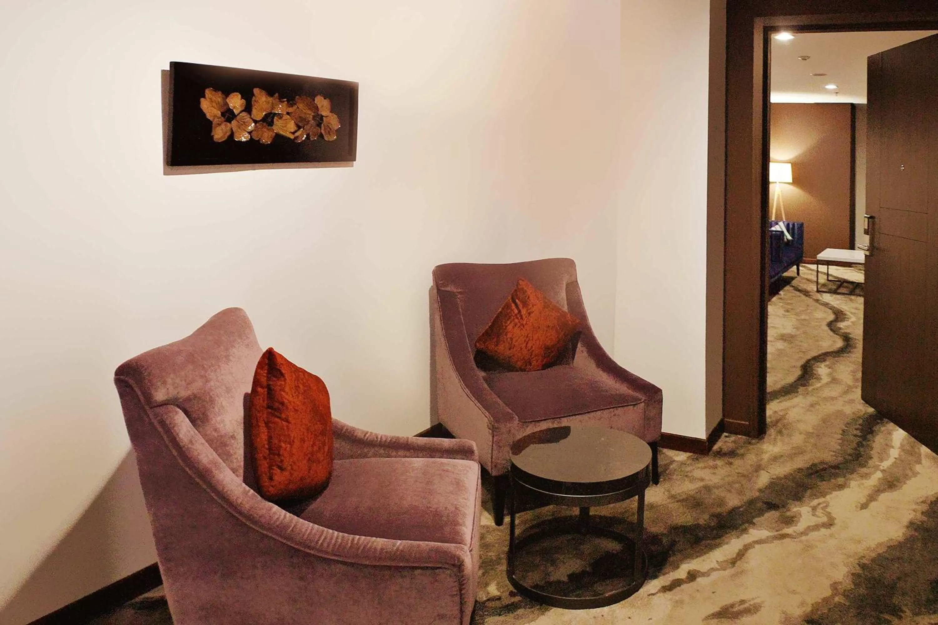 Living room in Vasaka Hotel Jakarta Managed by Dafam