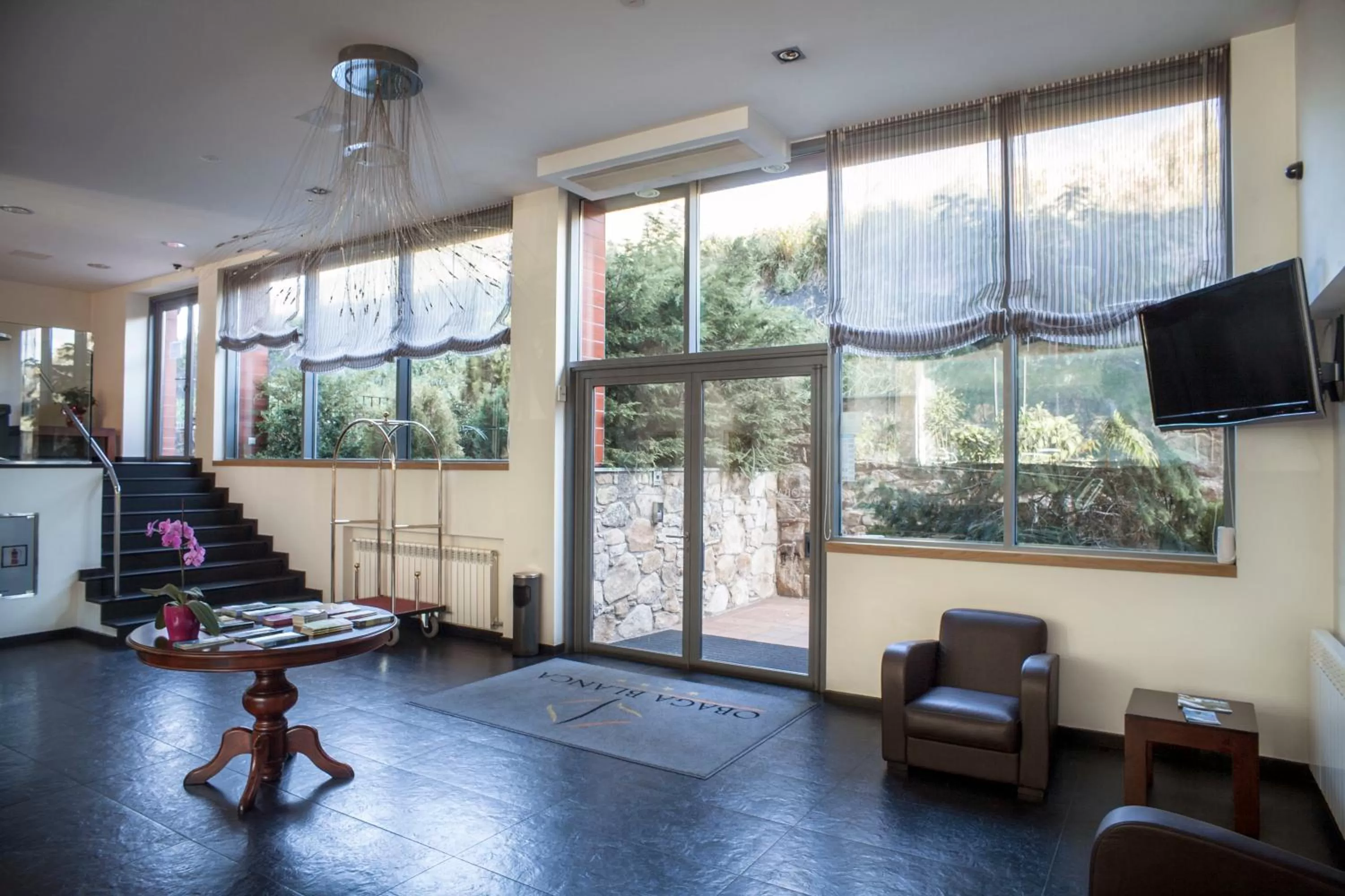 Lobby or reception in Obaga Blanca & Spa