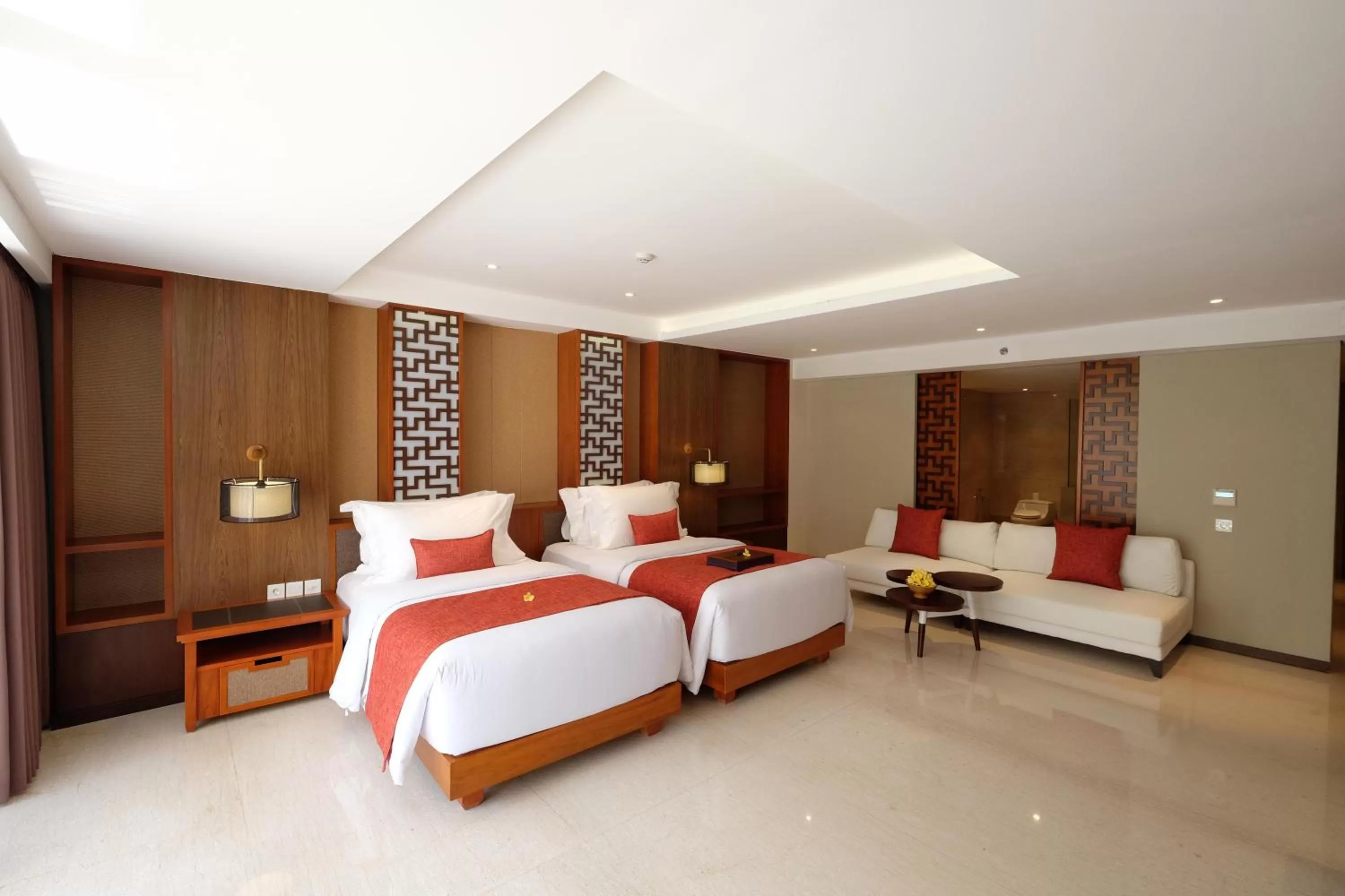 Seating area, Bed in The Bandha Hotel & Suites