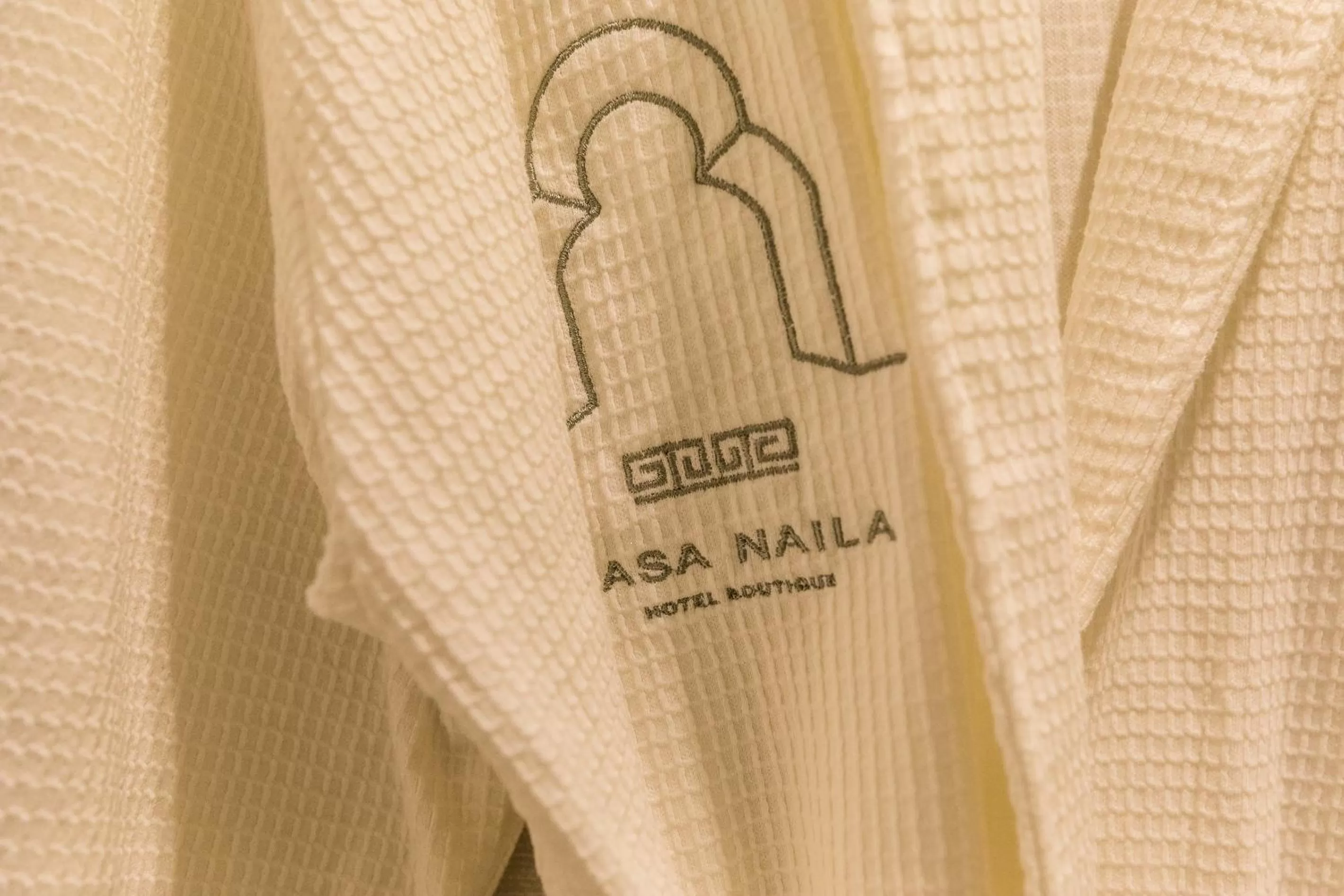 Text overlay in Casa Naila Hotel Boutique