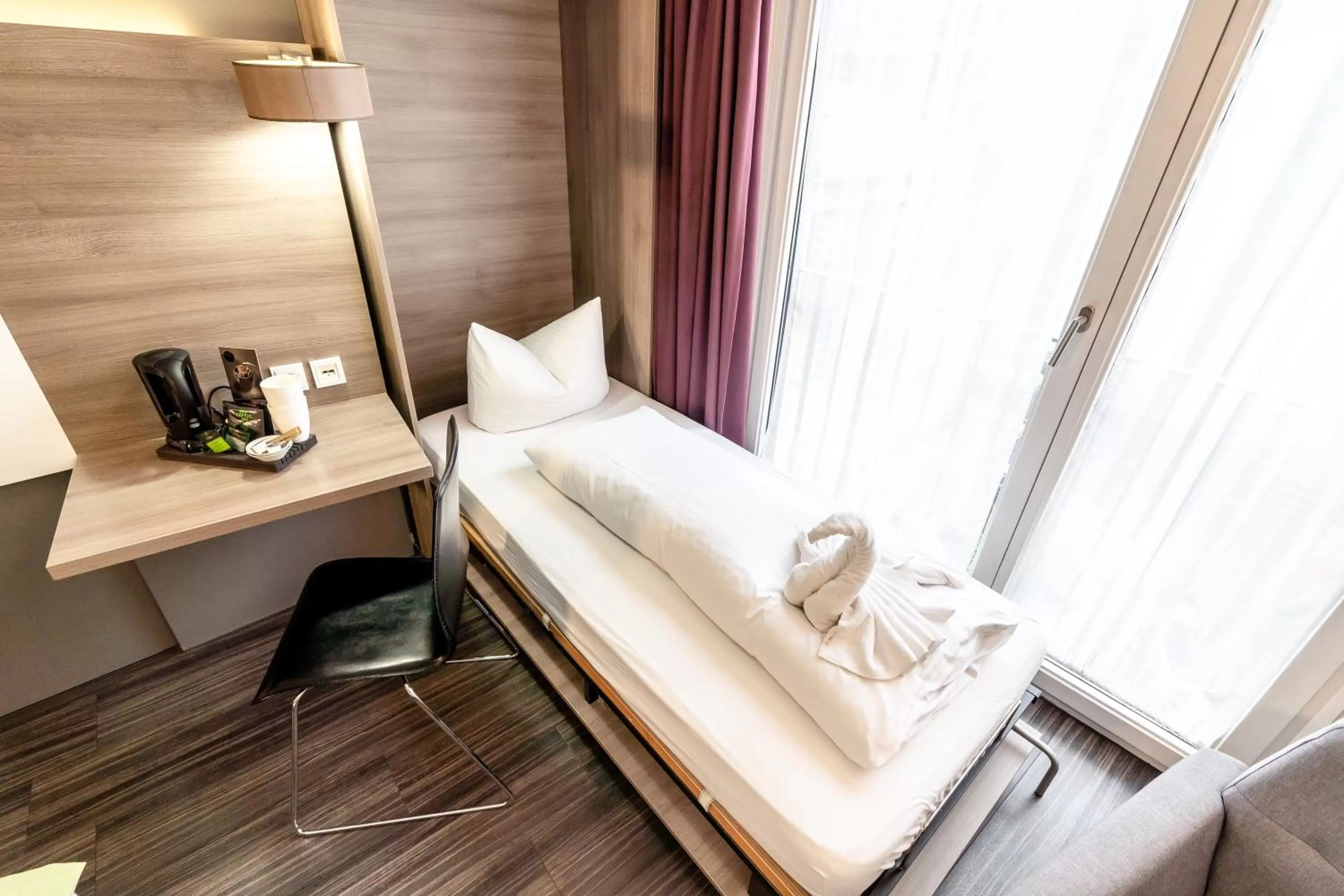 Bed in Hotel Demas City