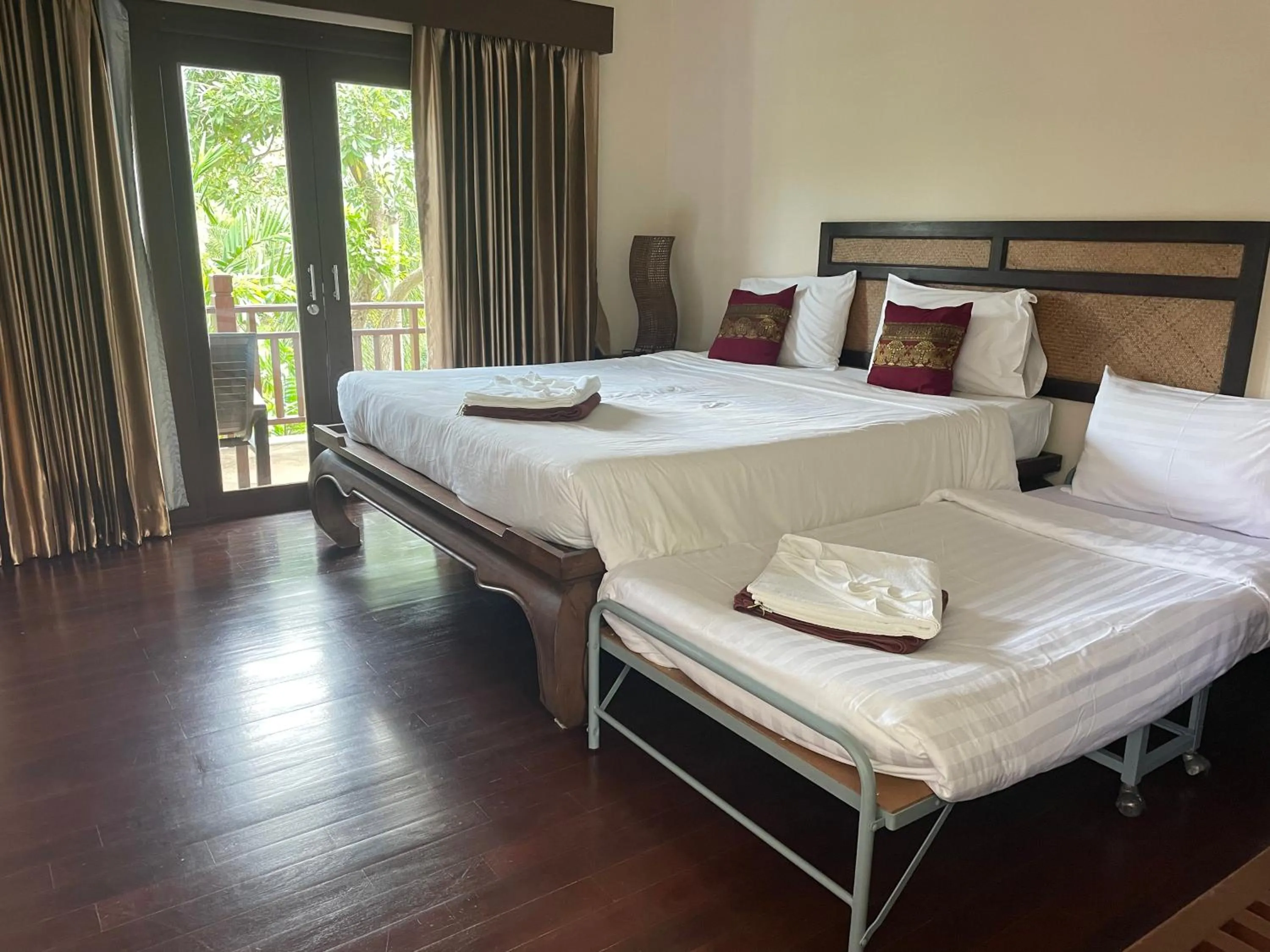 Bed in Grand Manita Beach Resort