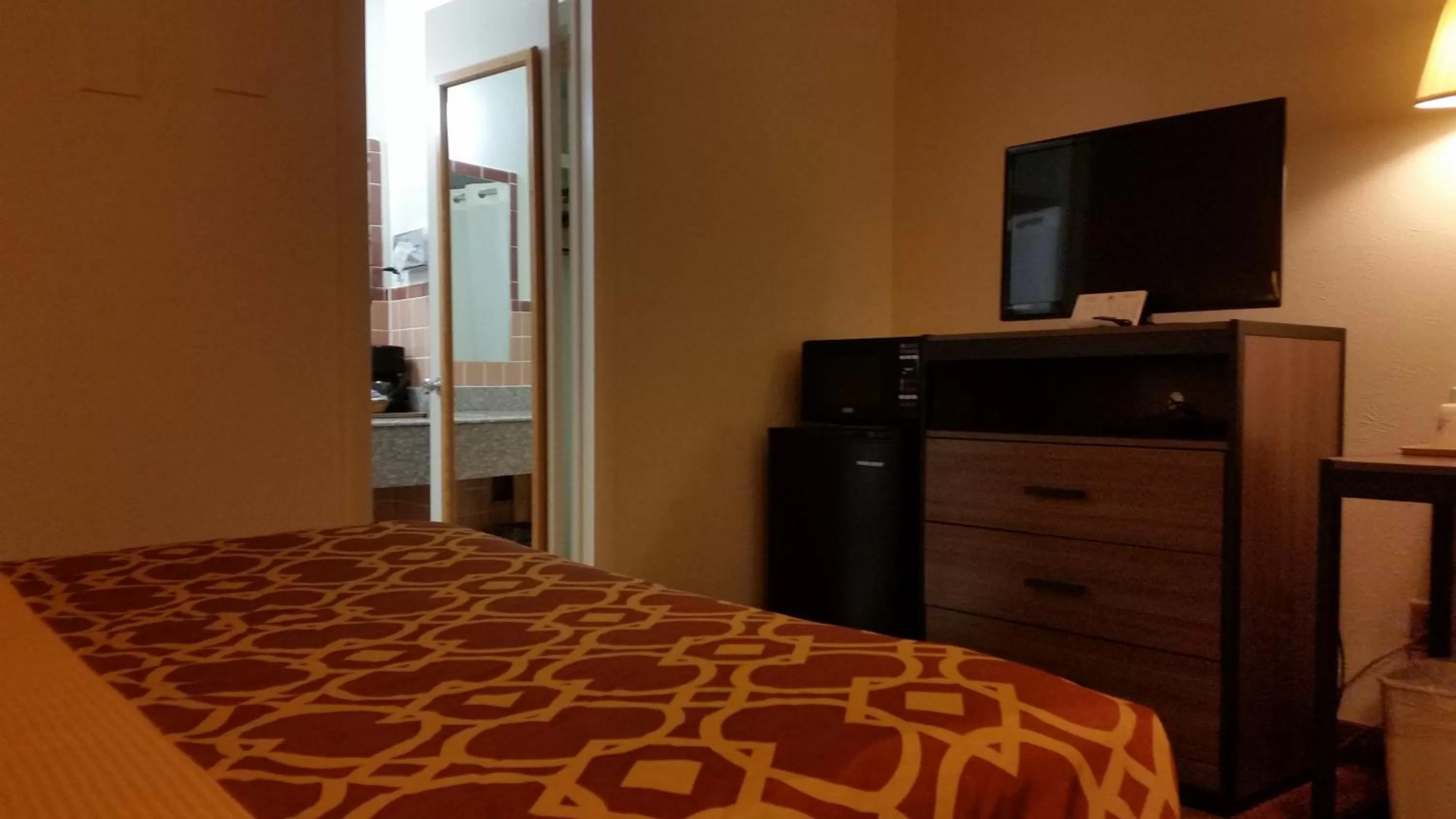 Bed in American Inn Of Liberal