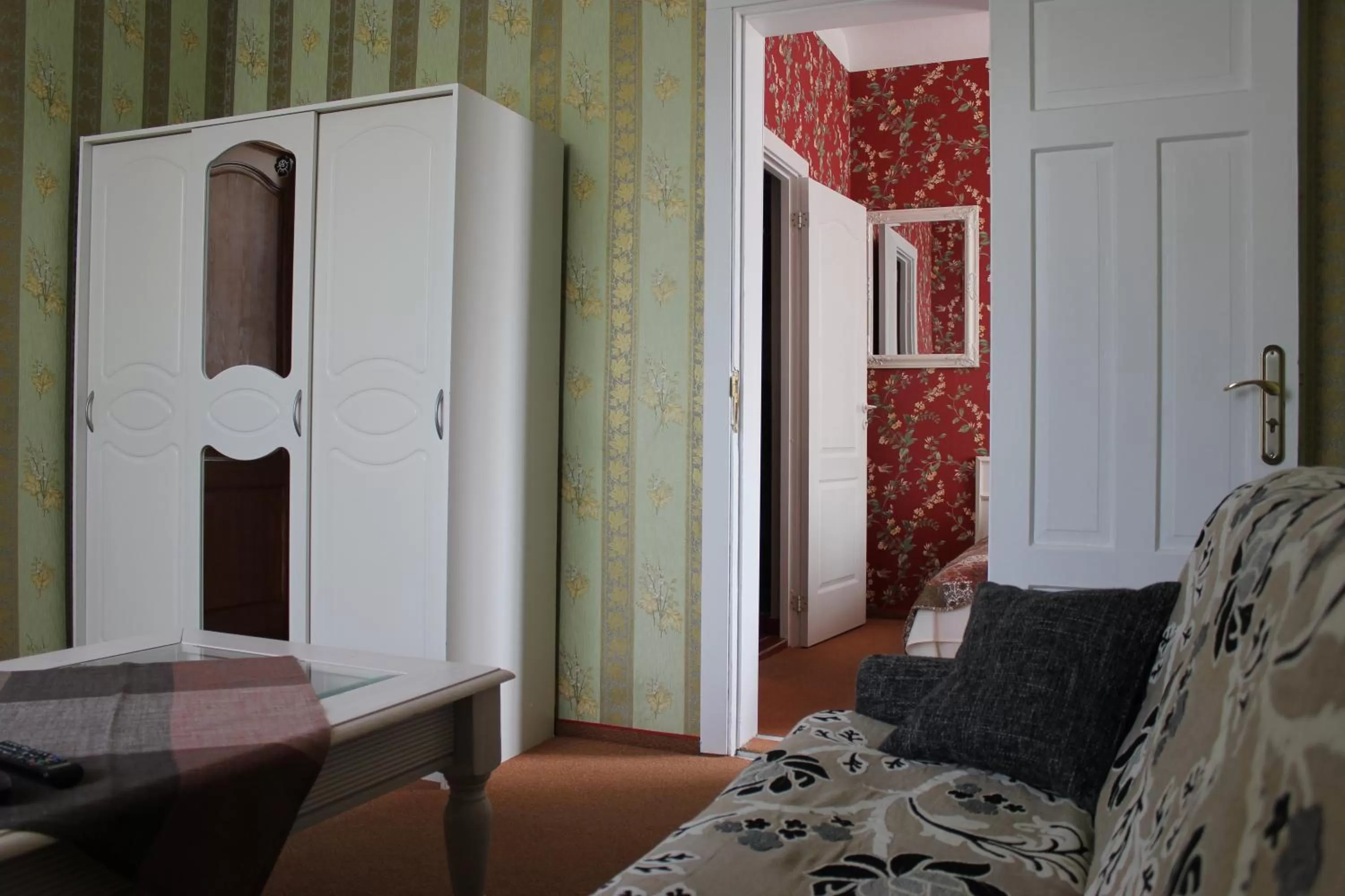Photo of the whole room in City Center Kaķis B&B