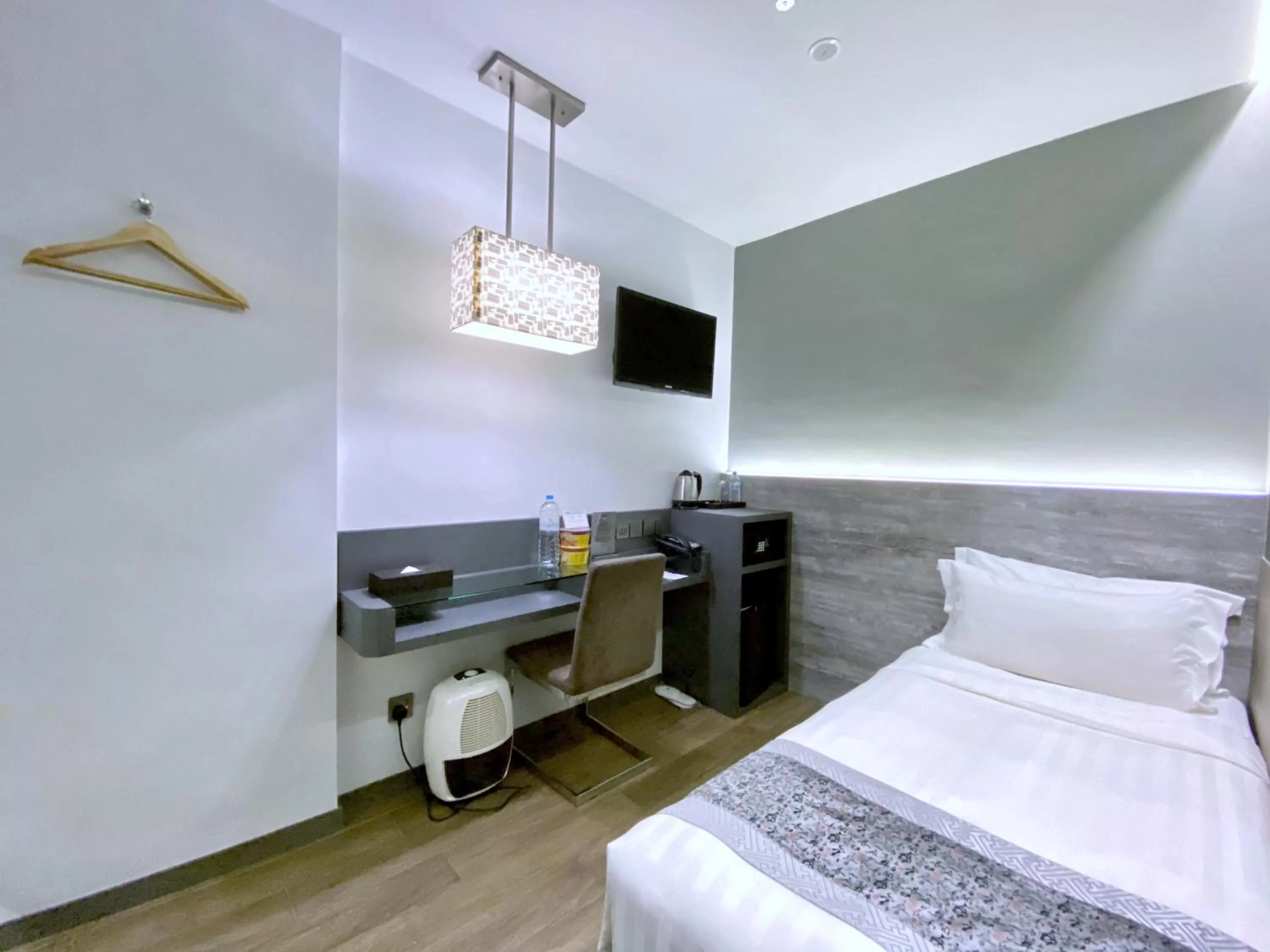 Bed in Bliss Hotel Singapore