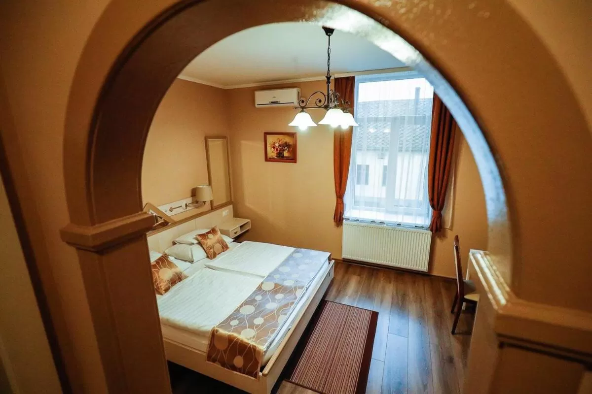 Photo of the whole room, Bed in Gőzmalom Étterem és Panzió