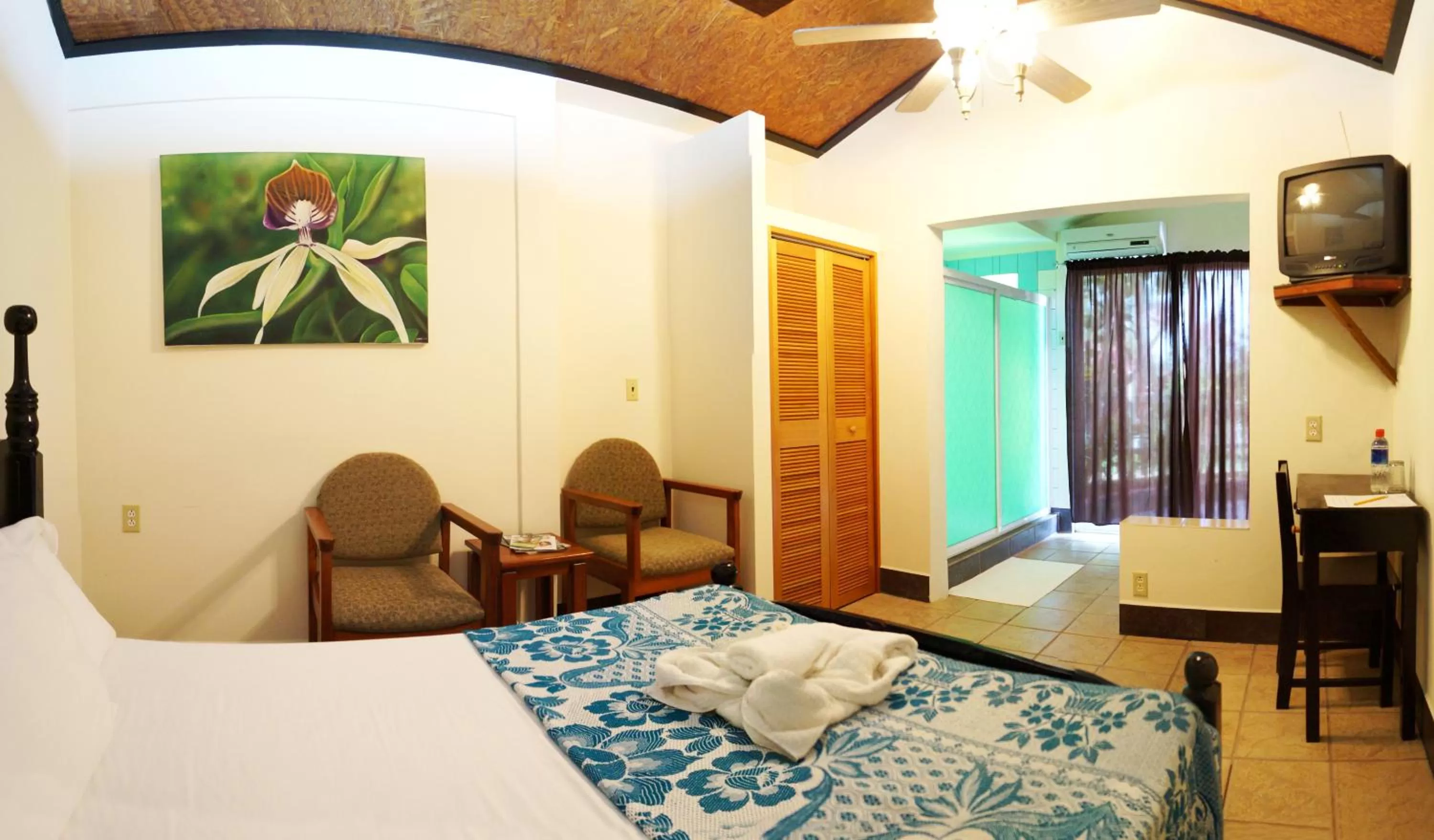 Bed in Rumors Resort Hotel