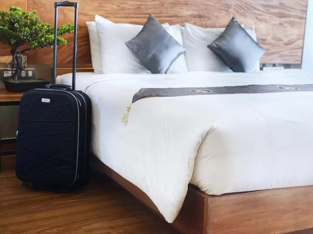 Bed in Lanna Tree Boutique Hotel