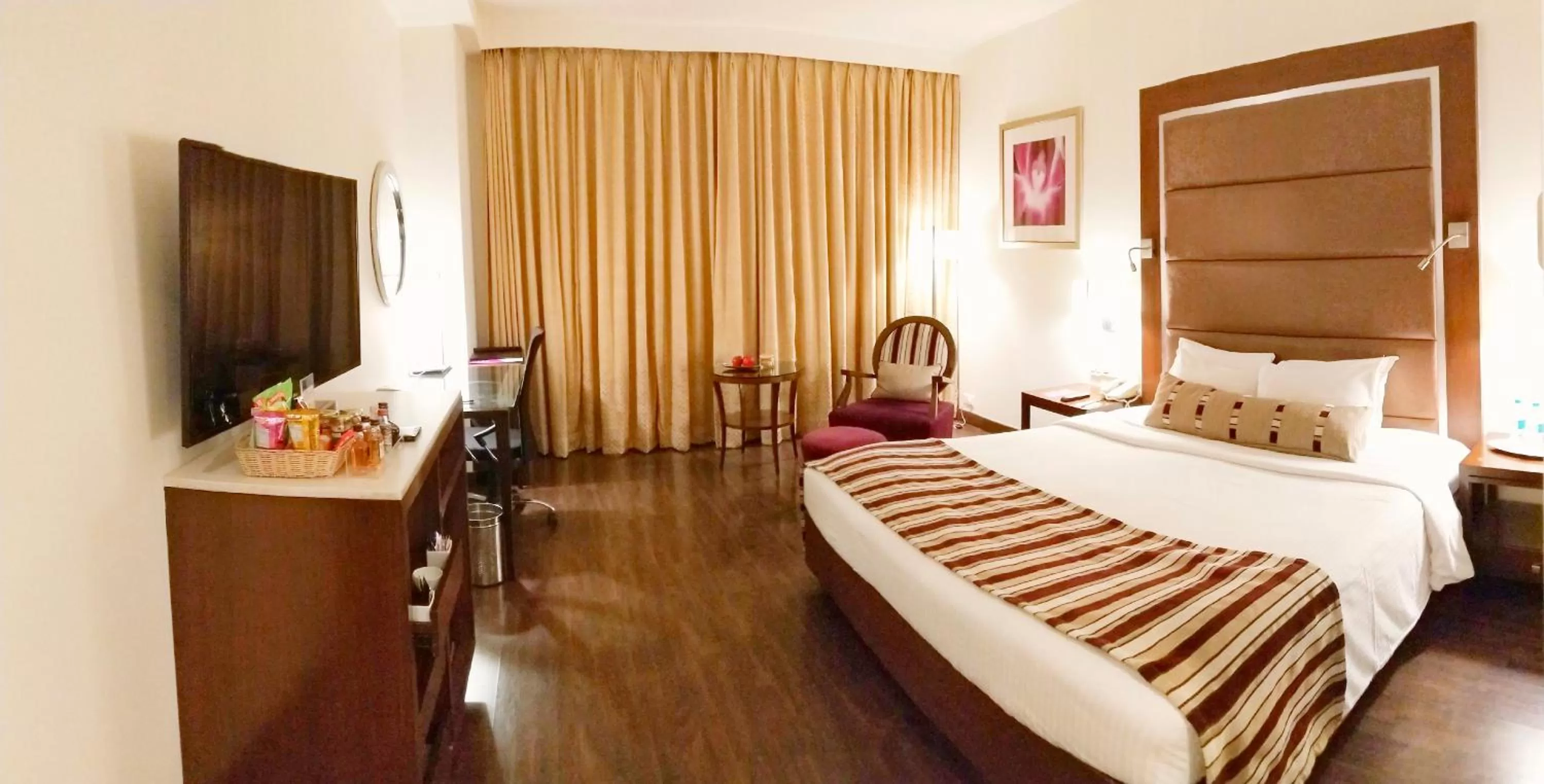 Photo of the whole room, Bed in Royal Orchid Central, Pune