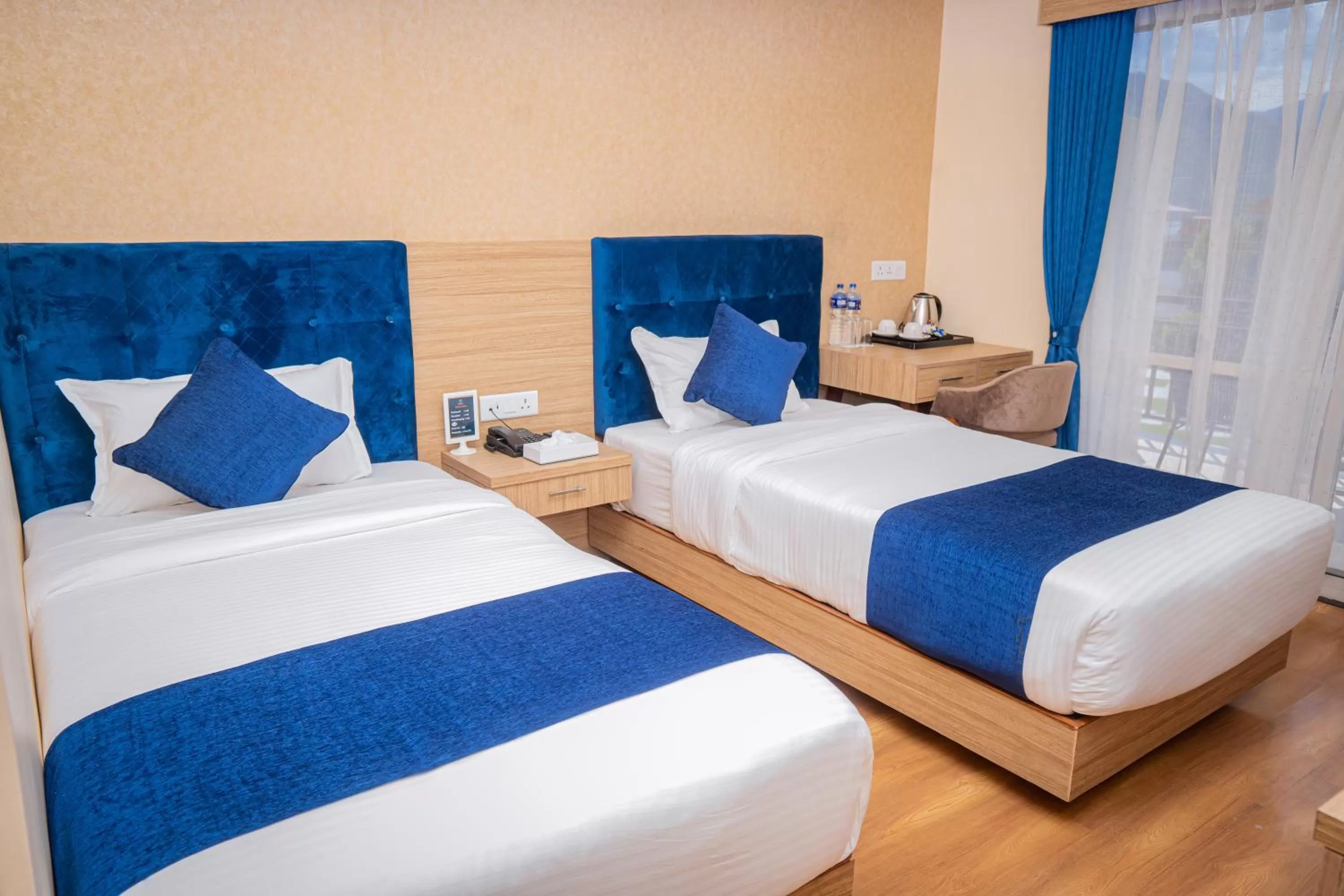 Bed in Majestic Lake Front Hotel & Suites